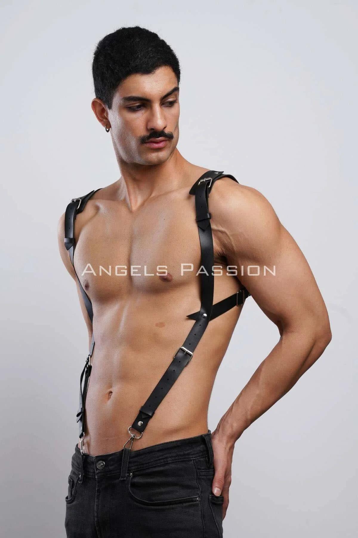 Black faux leather body harness diagonal strap detail showing punched adjustment holes