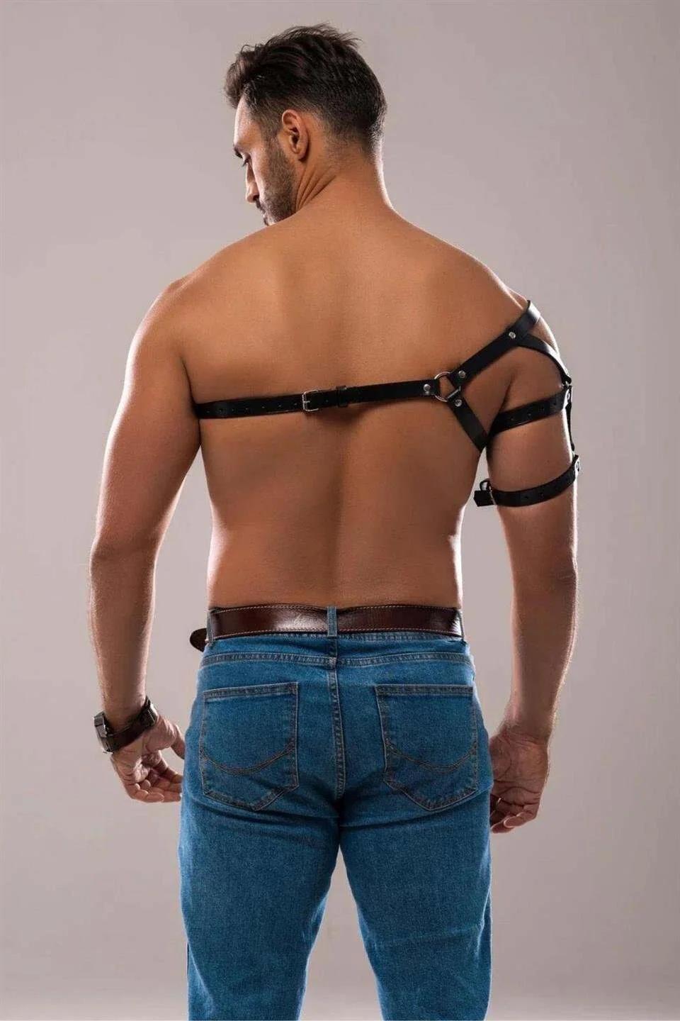 close-up of silver-tone rectangular buckles on black PU shoulder harness strap junction