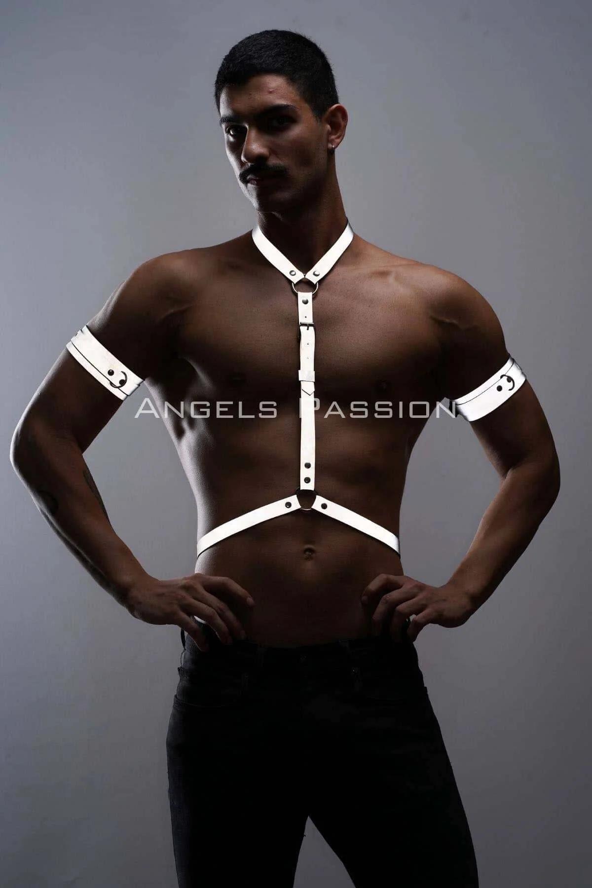 Front view of white reflective Y-strap harness with central O-ring and waistband on male torso