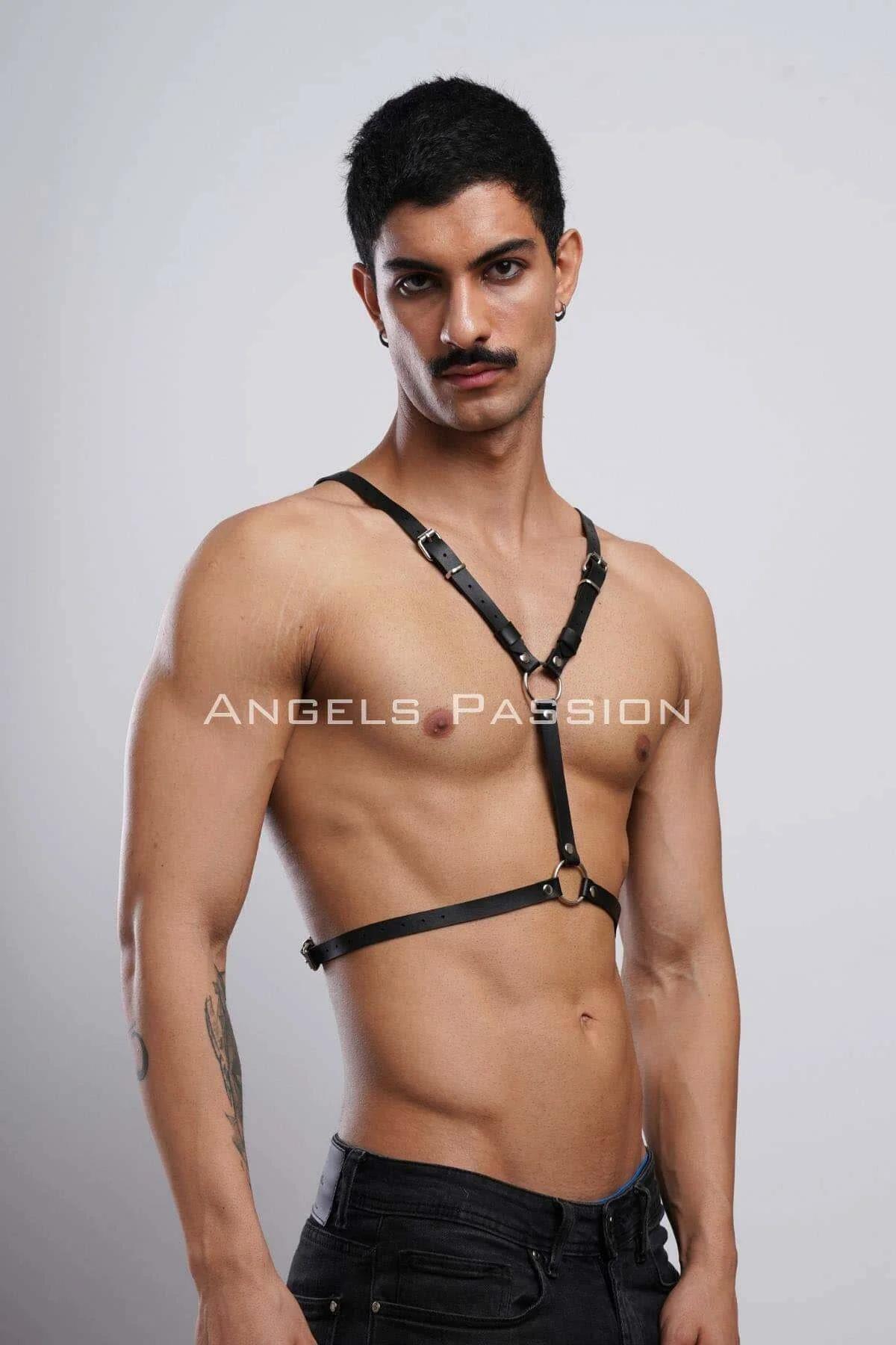 Adjustable silver buckle waist strap on black bat wing body harness close-up