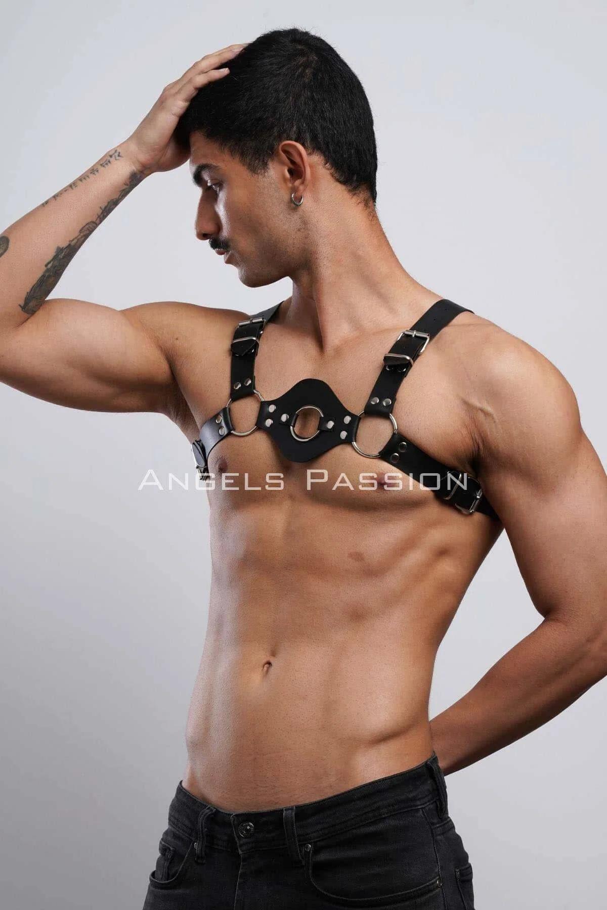 Black adjustable chest harness with silver buckle shoulder straps, side view showing strap width