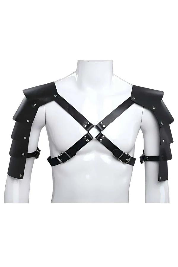 Black faux leather shoulder armor harness with three-tier pauldrons, silver rivets, X-cross chest straps, and central O-ring 