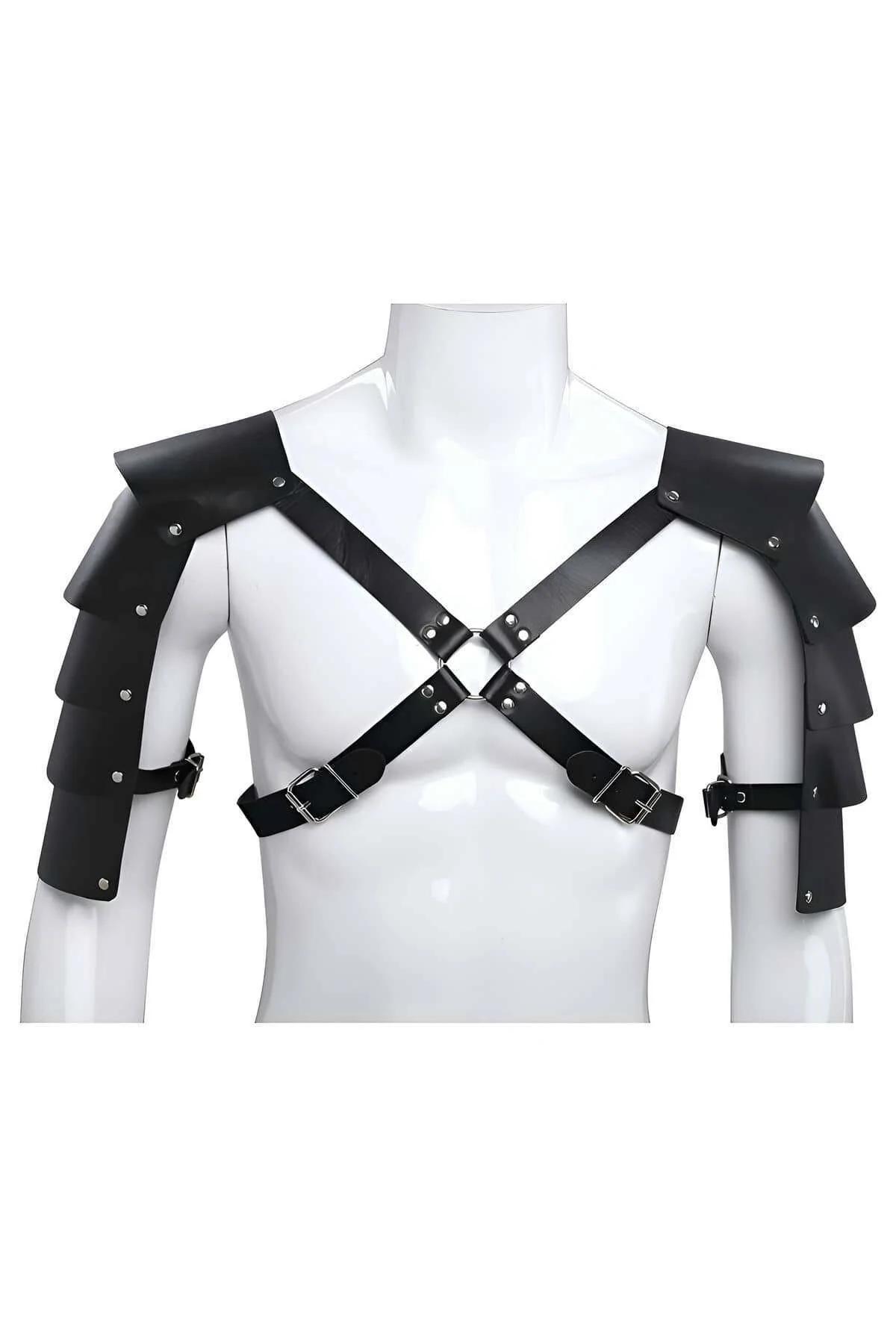 Black faux leather shoulder armor harness with three-tier pauldrons, silver rivets, X-cross chest straps, and central O-ring 