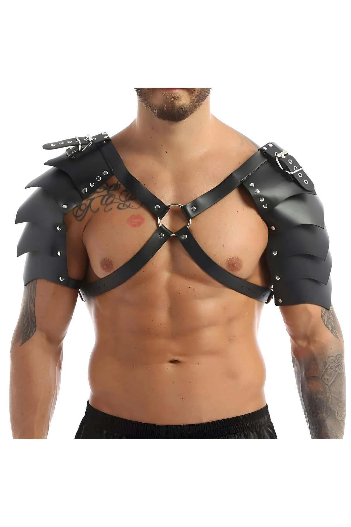 Close-up of black faux leather layered shoulder pauldron panels with silver dome rivets and adjustable buckle tab