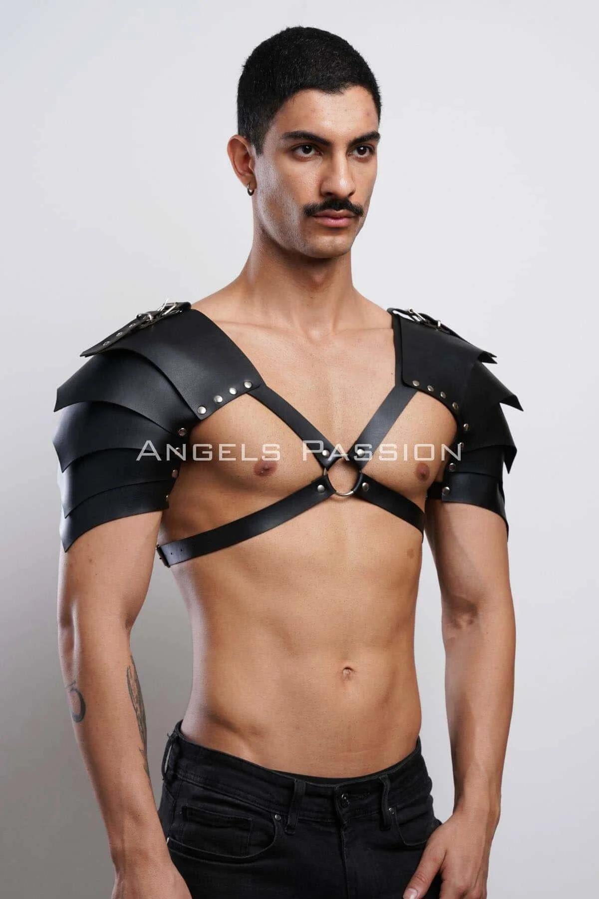 Side view of black shoulder armor harness showing adjustable buckle tabs connecting plates to chest straps
