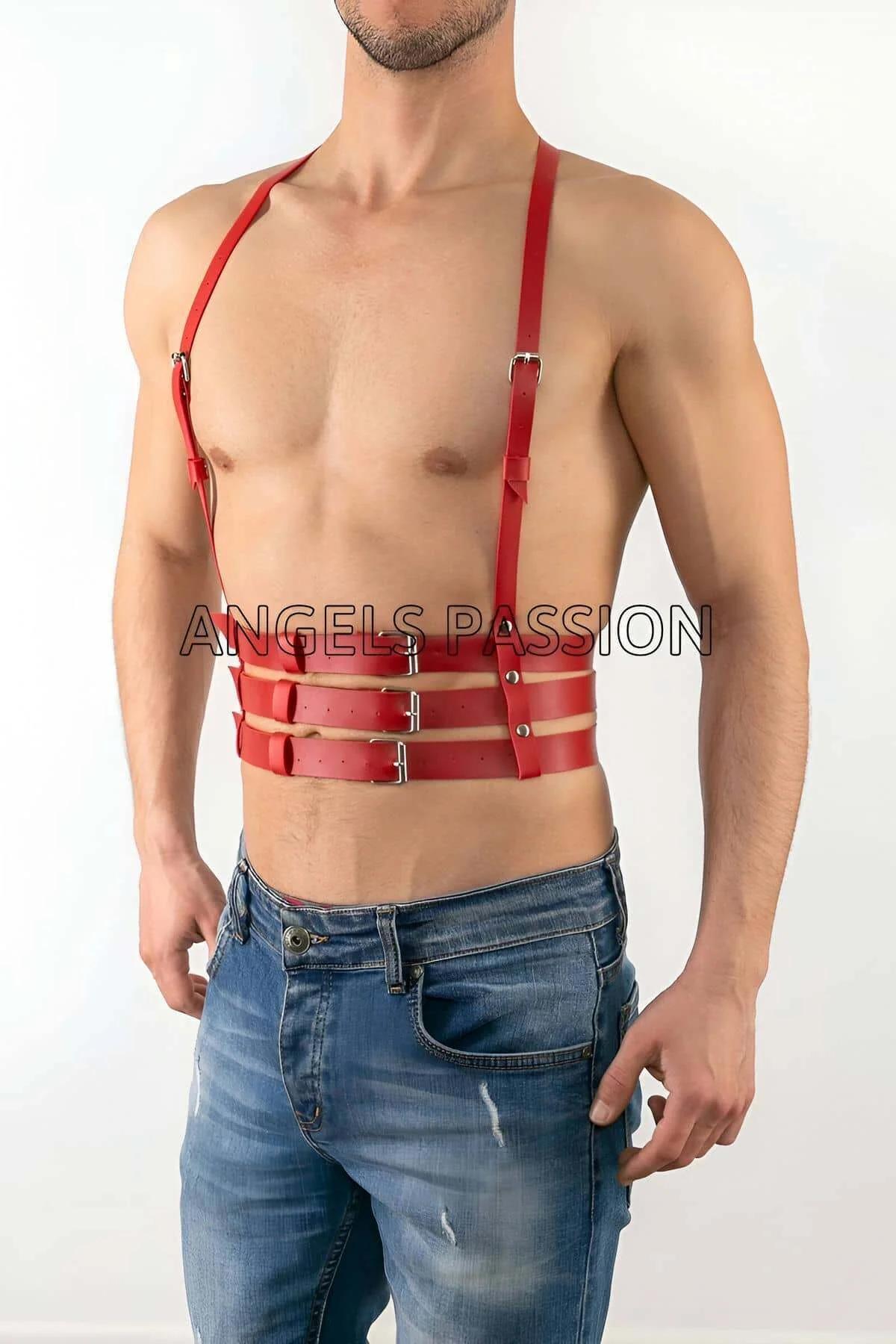 close-up of red faux leather strap and silver-tone pin buckle detail on chest harness