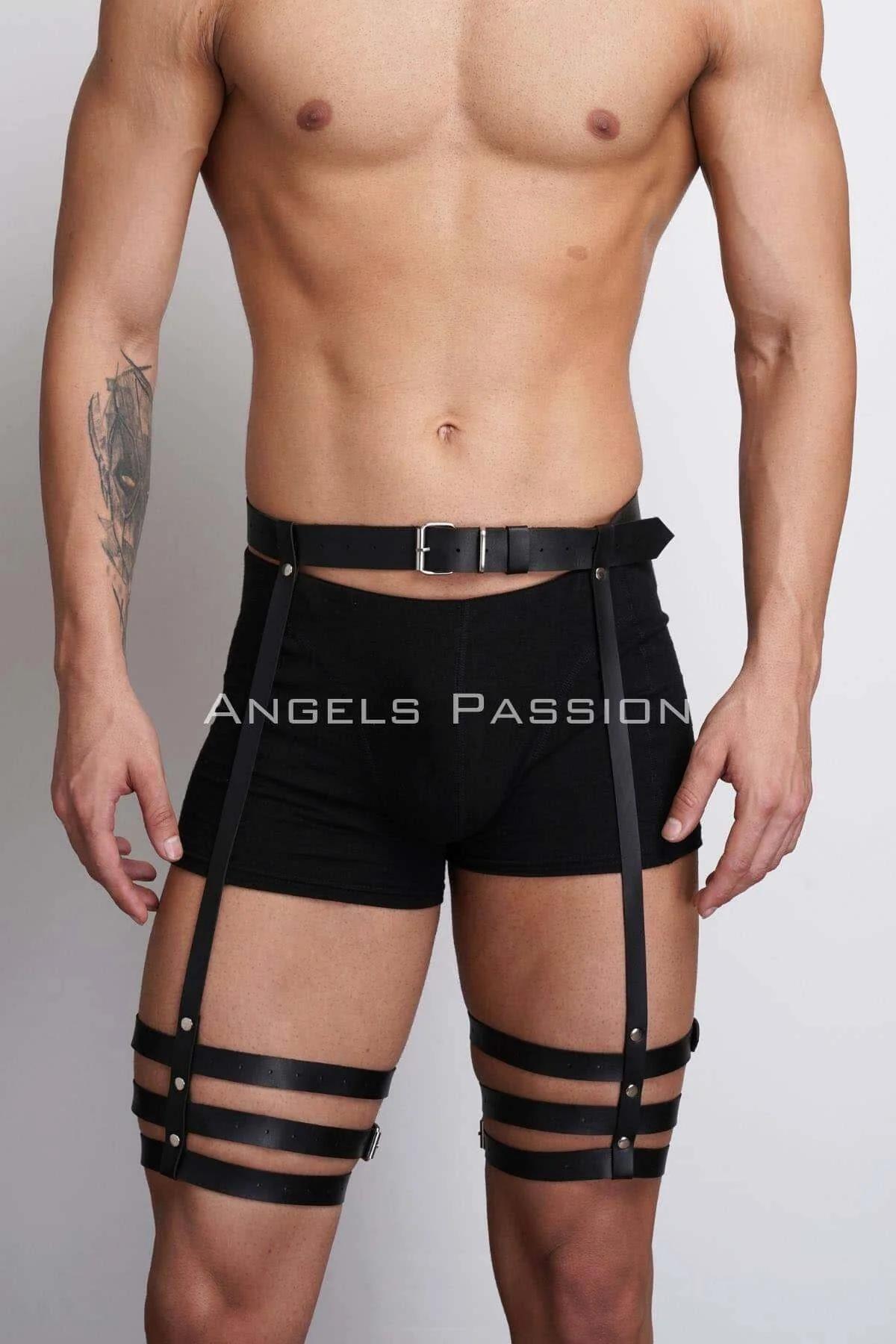 close-up of triple horizontal black faux leather thigh bands with silver rivets on leg harness