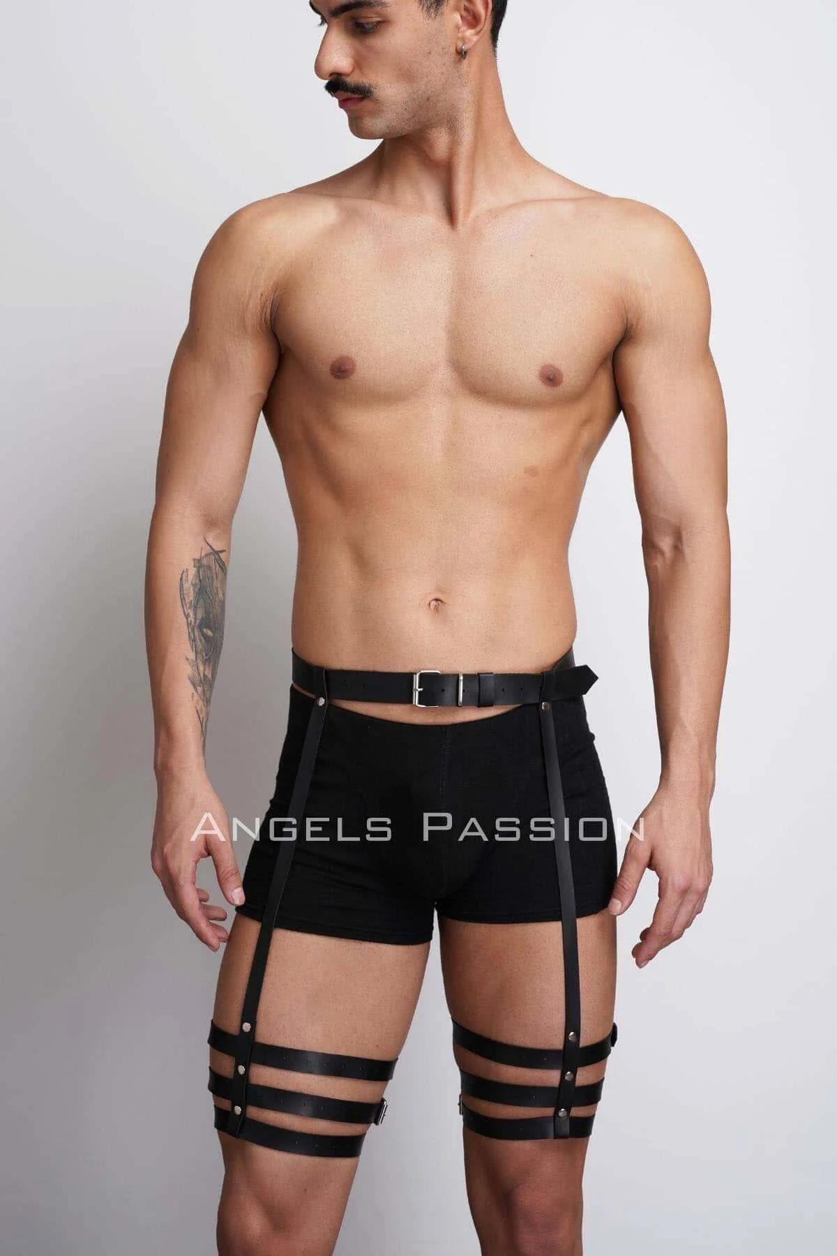 rear view of black adjustable leg harness showing vertical connector straps and thigh band placement
