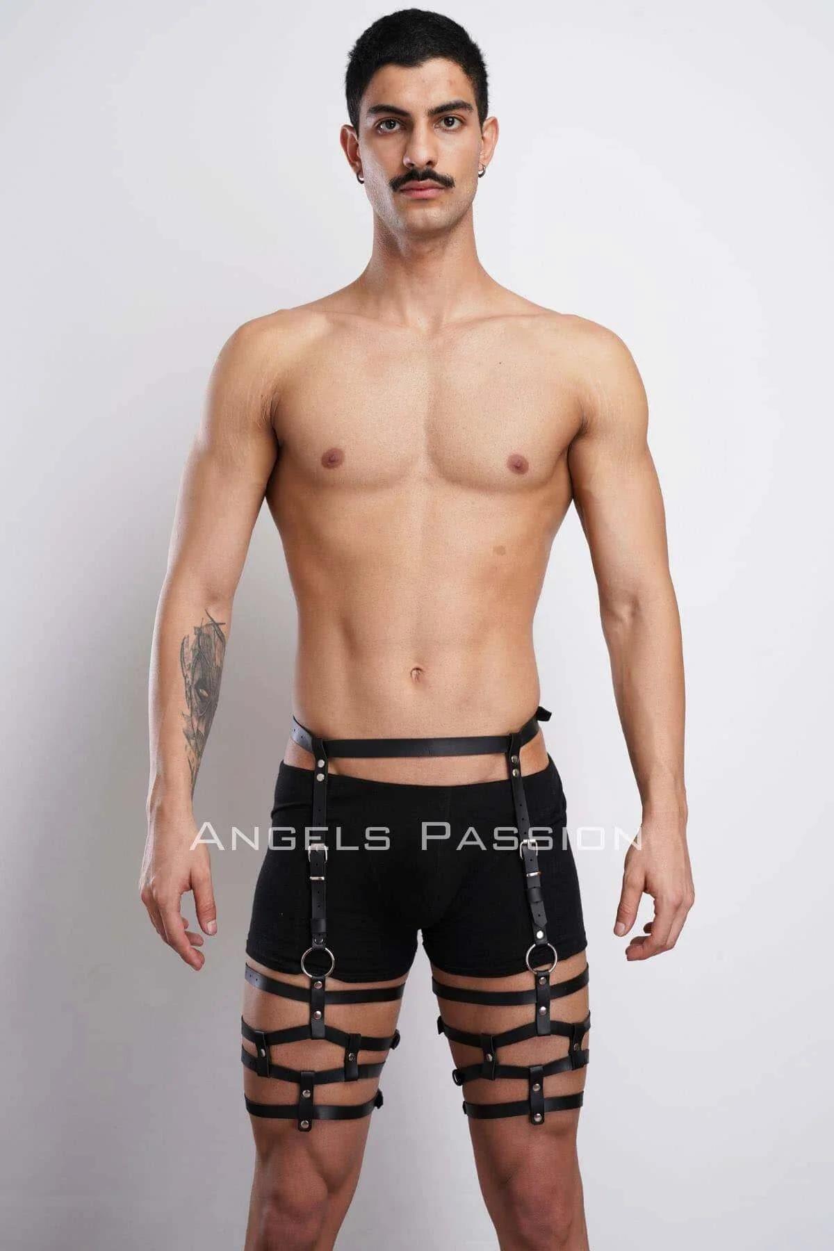 adjustable vertical hip-to-thigh connector strap with silver buckle on black leg harness