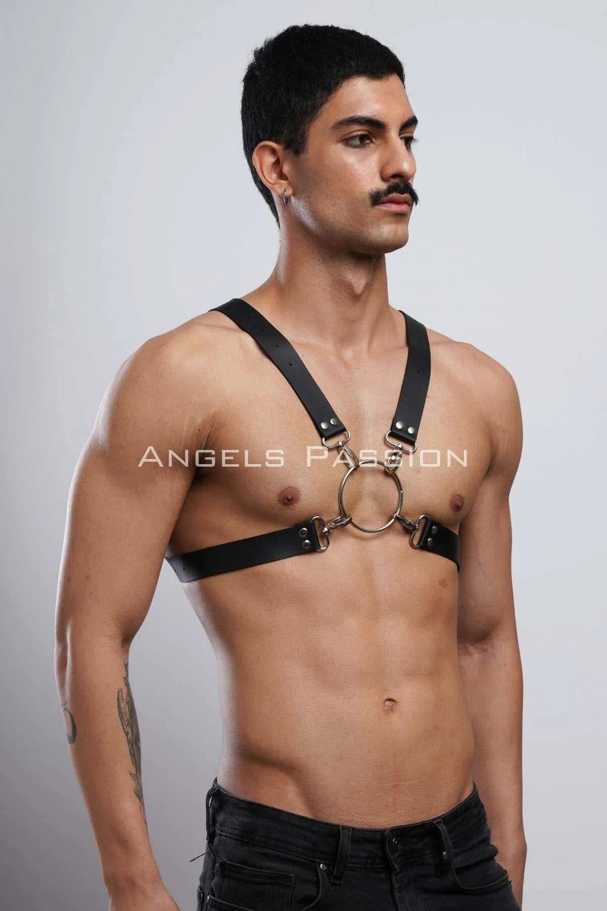 Black mens chest harness with silver hardware laid flat showing full strap layout