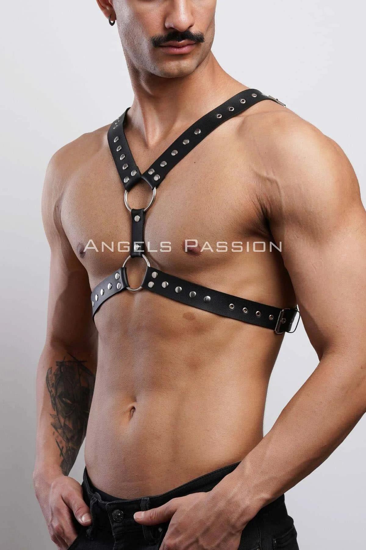 side view of black PU leather chest harness showing adjustable metal buckle closure