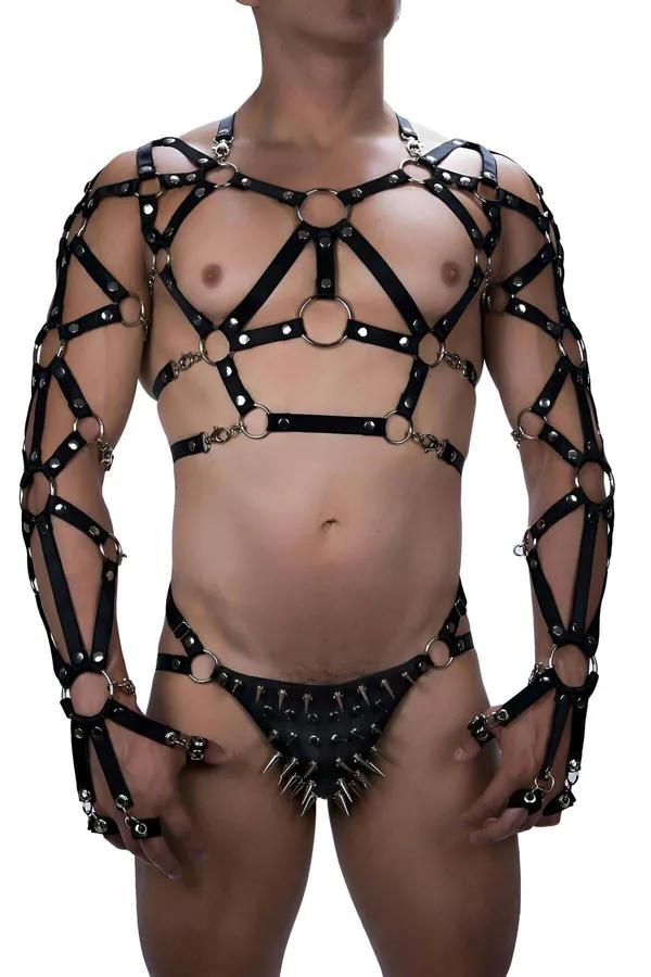 Black faux leather full body harness with silver O-rings, cage arm sleeves, and detachable spiked thong front view