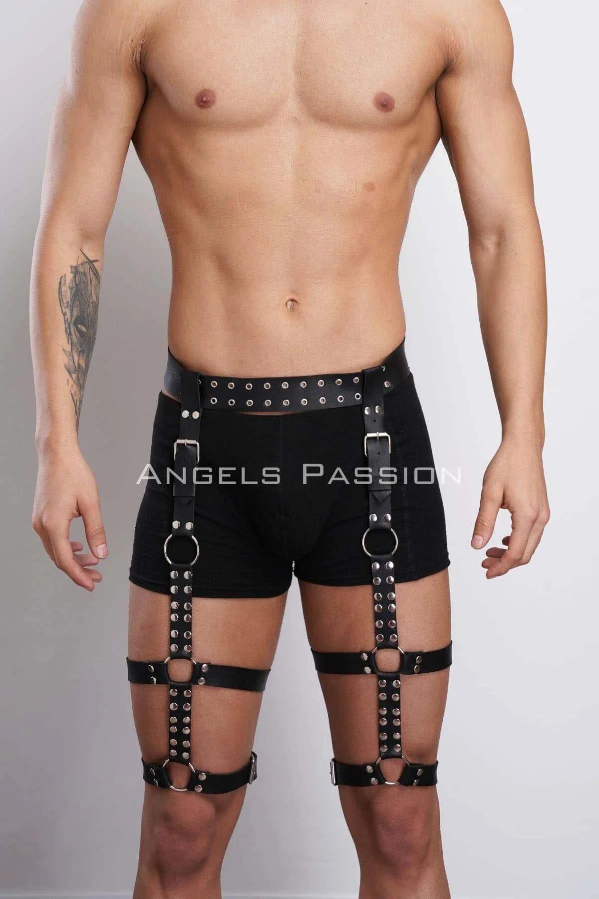 close-up of silver dome rivets and O-ring hardware on black faux leather thigh strap