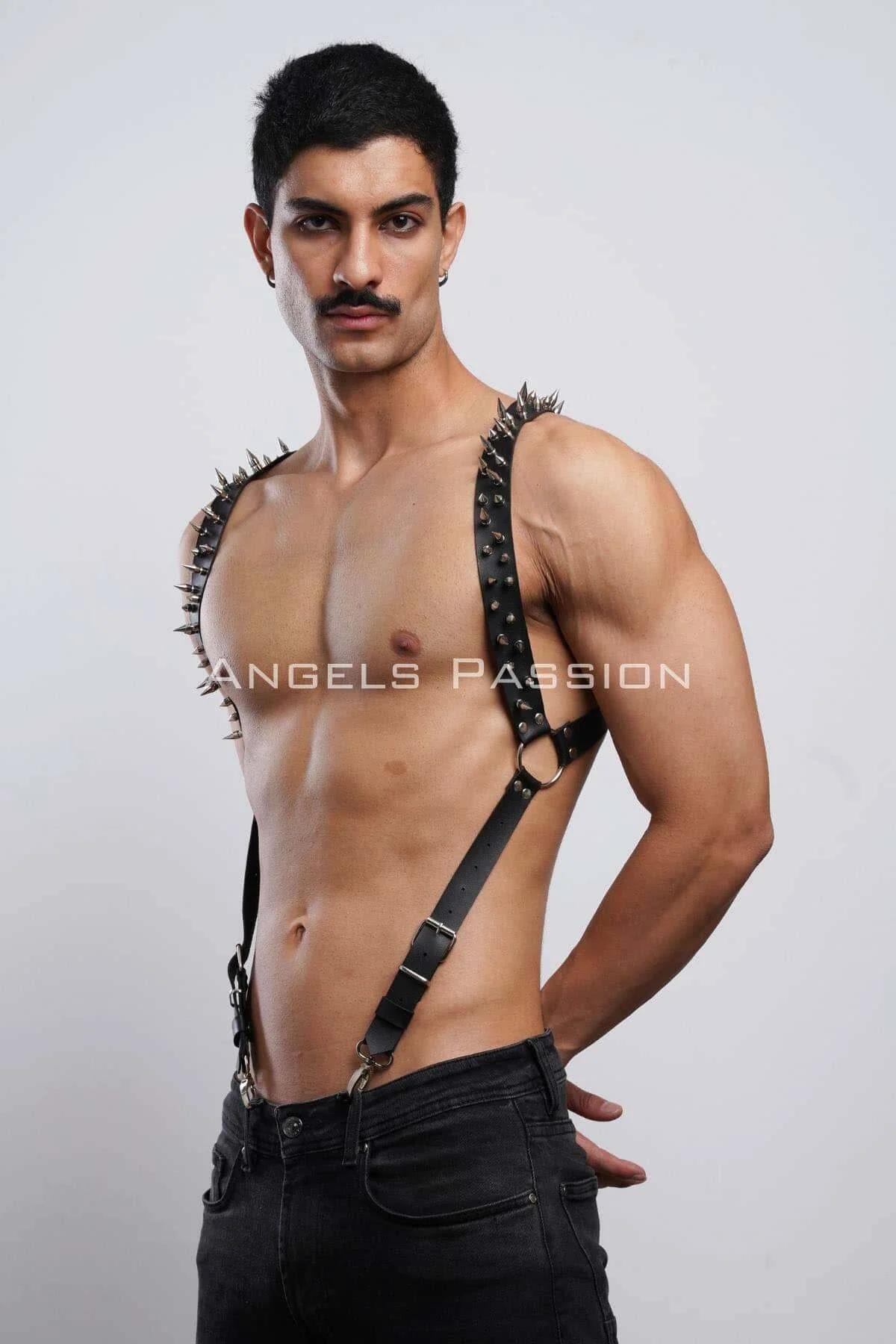 Back view of black spiked faux leather harness showing single-shoulder asymmetric fit