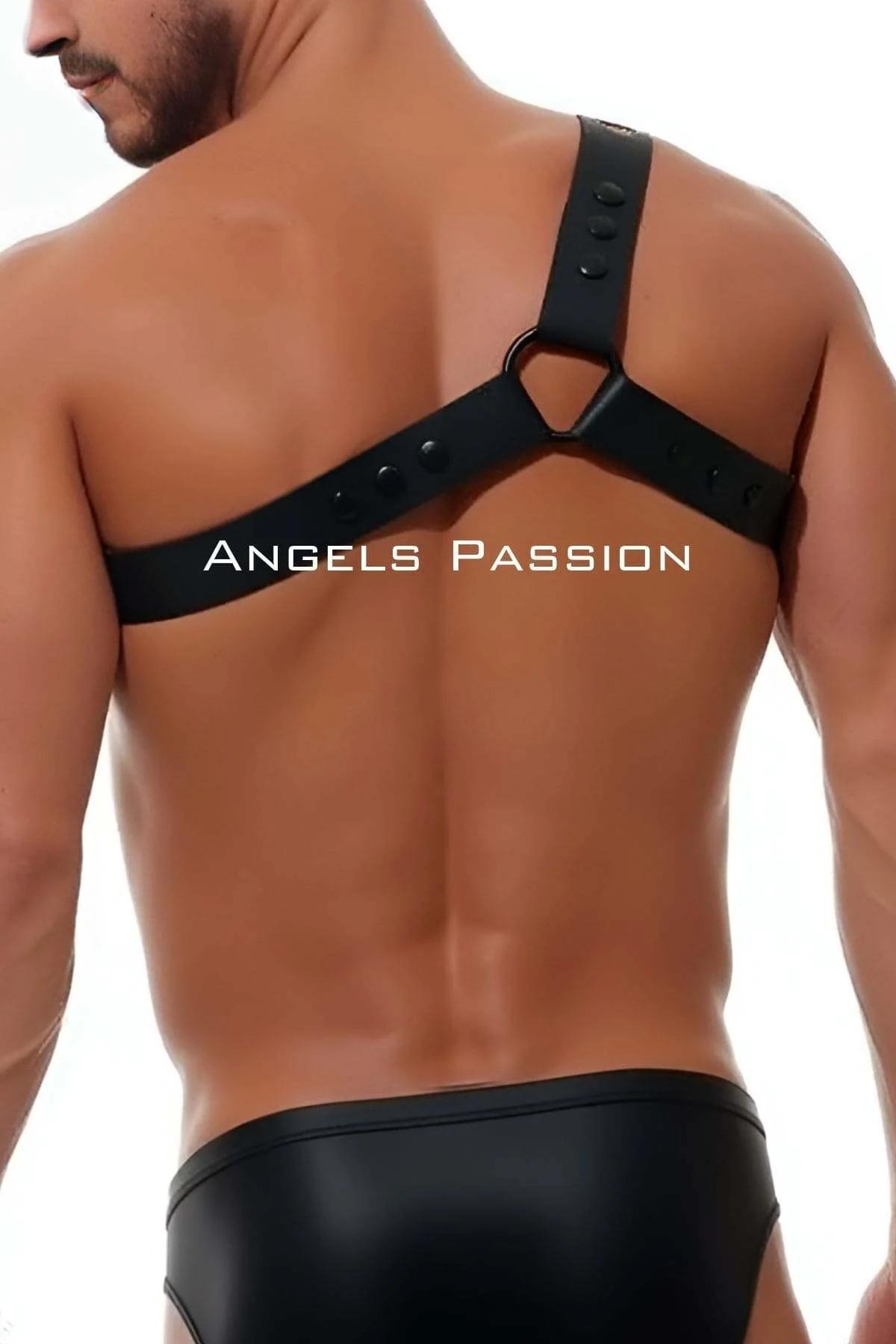 black grommet wristband included with asymmetrical chest harness set laid flat detail view