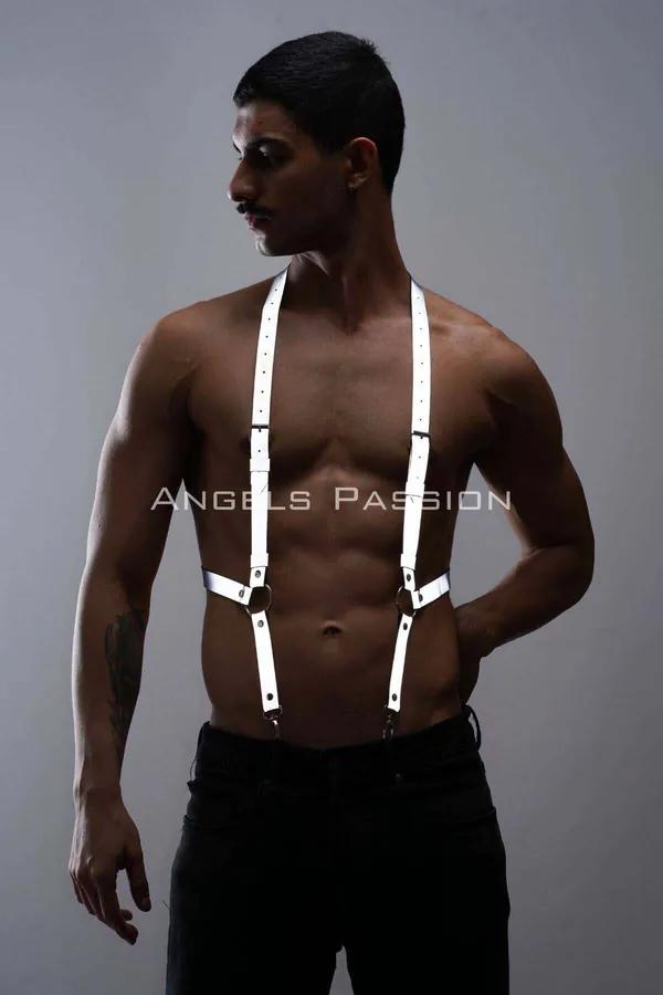 White reflective chest harness with silver O-ring detail and Y-strap configuration worn on male torso