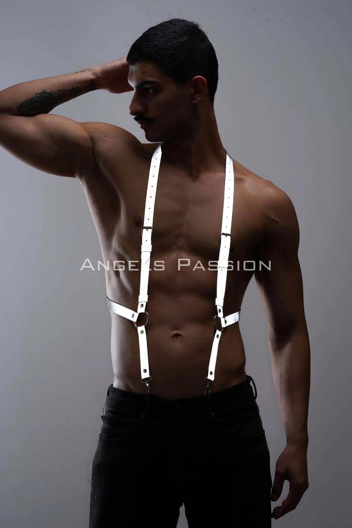 Adjustable metal buckle and eyelet detail on white reflective harness shoulder strap