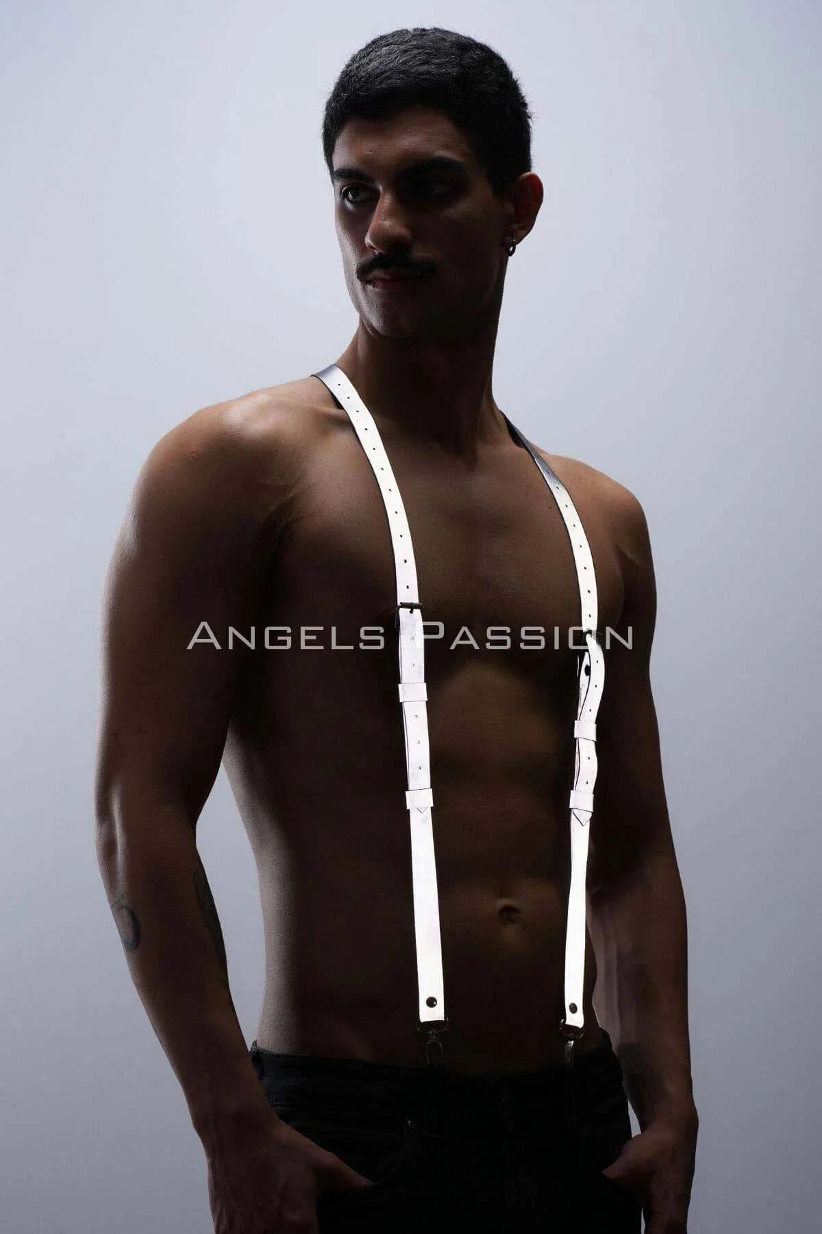 White reflective suspenders harness laid flat showing full strap length and hardware detail