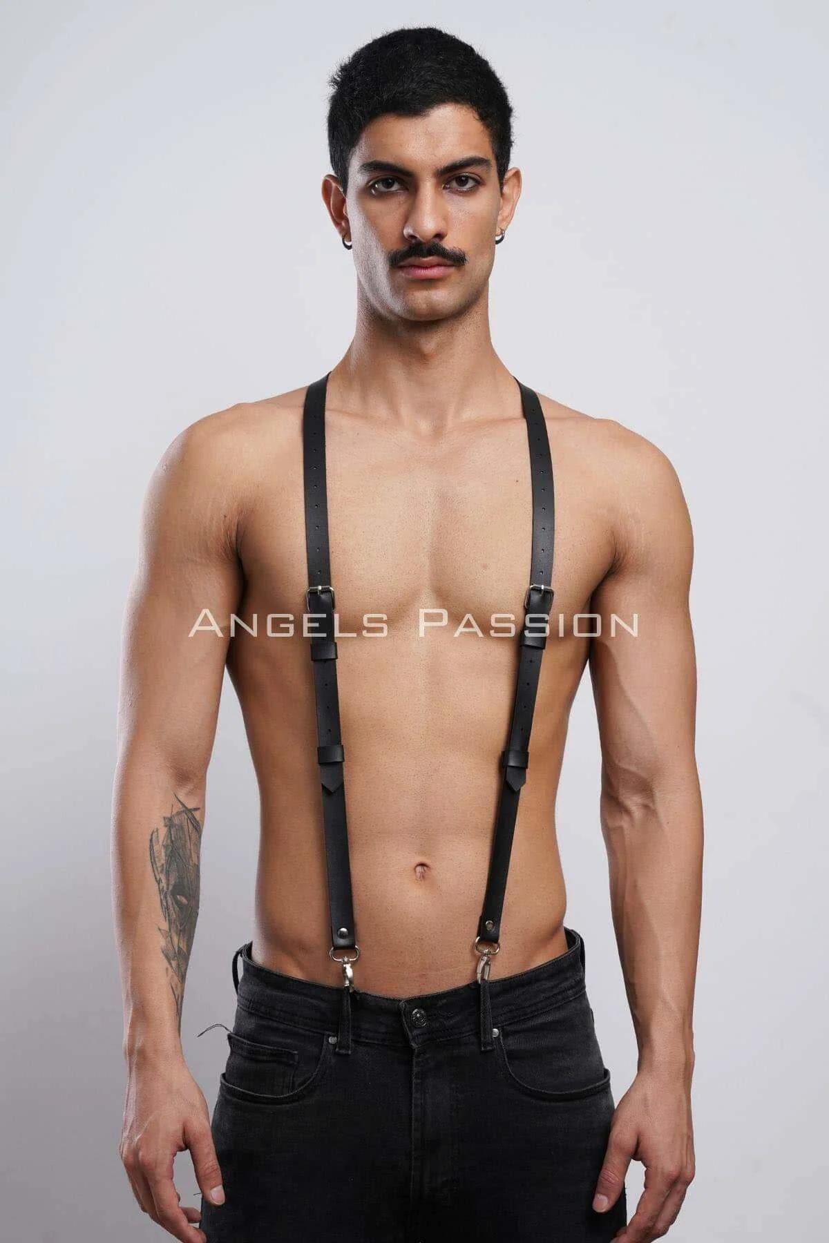 Close-up of silver slide buckle on black faux leather shoulder harness strap
