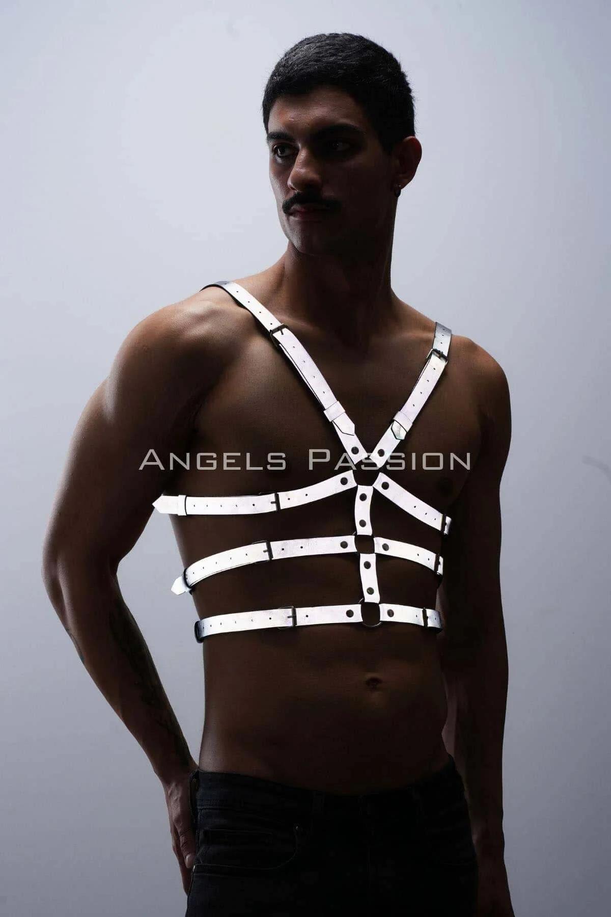 white reflective PU chest harness with central gunmetal O-ring and four adjustable roller buckles worn by male model