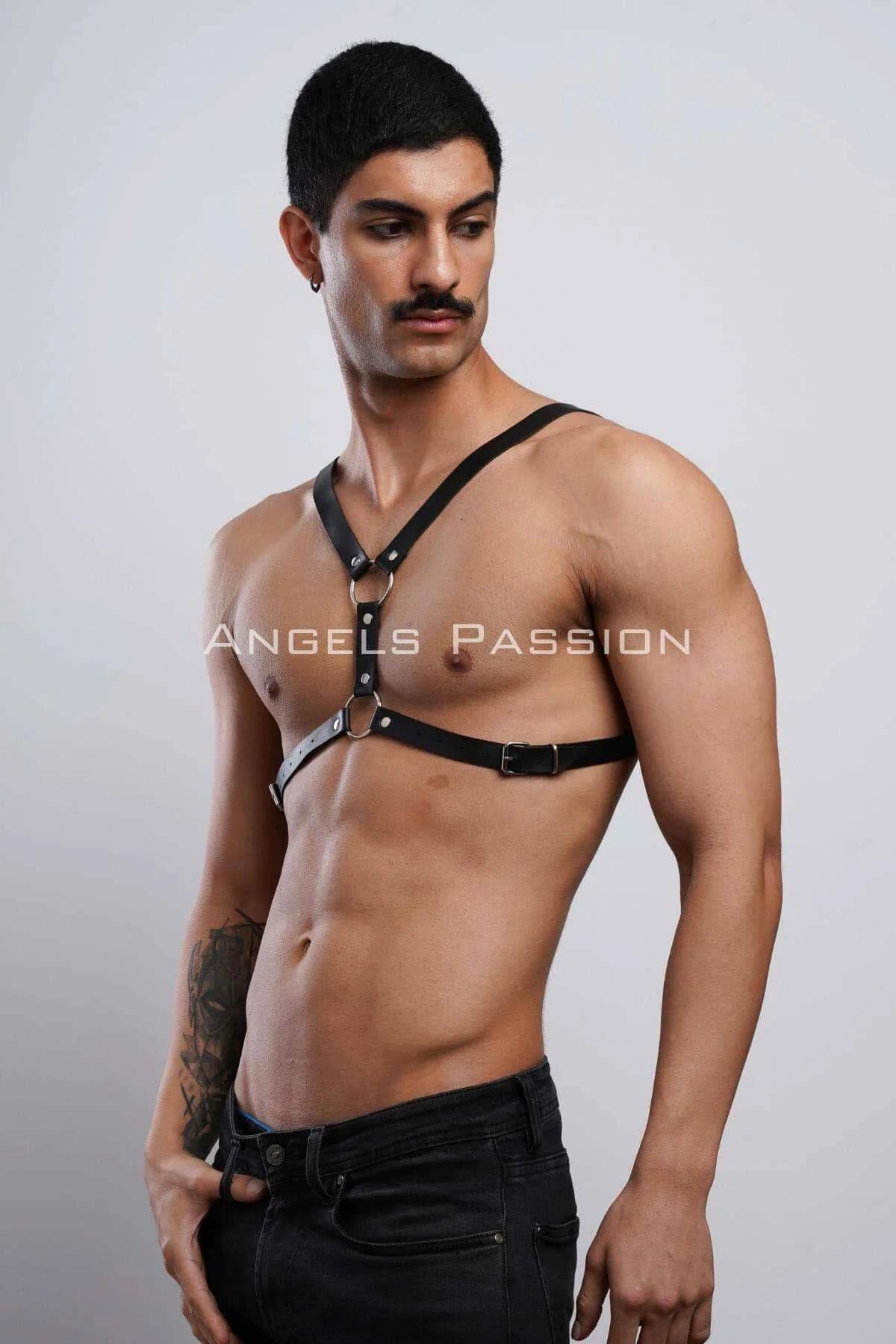 Side profile of black vegan leather chest harness showing Y-strap shoulder junction
