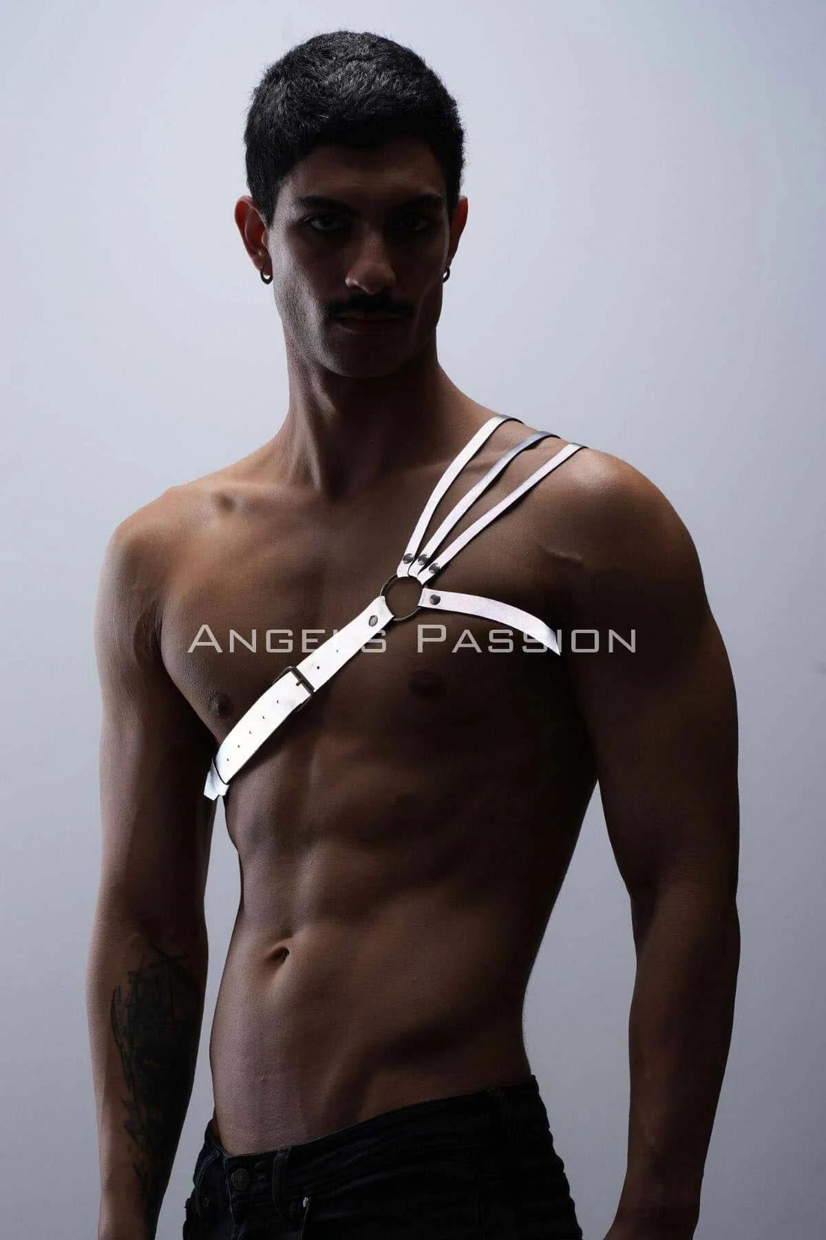 Asymmetrical chest harness white reflective surface catching light at O-ring junction