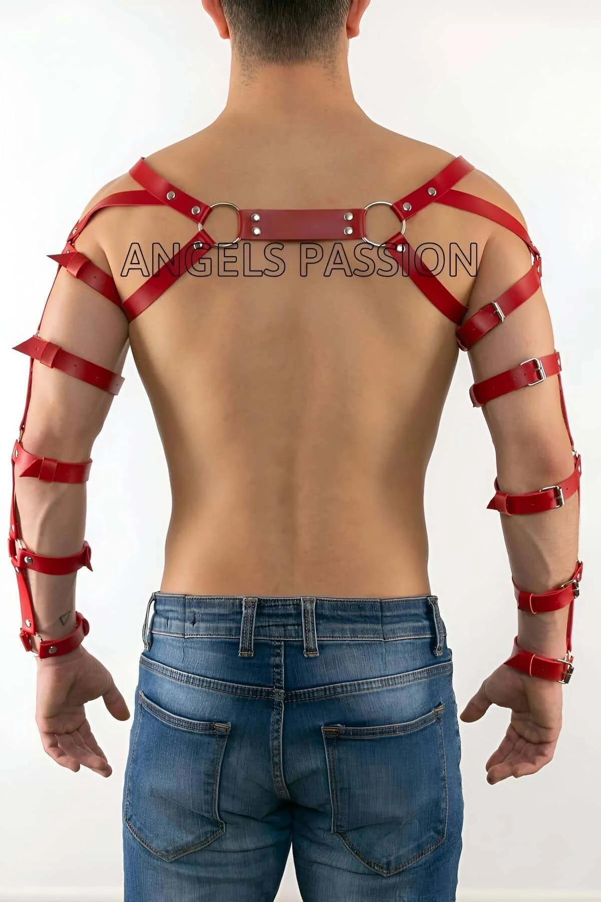 Red PU leather chest harness with two silver O-rings viewed from the front on male torso