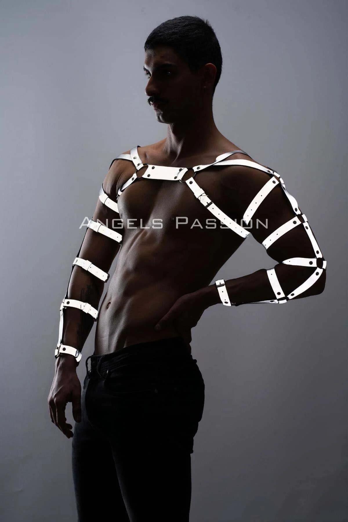 White reflective faux leather arm and chest harness set on man showing full arm cage and chest strap structure