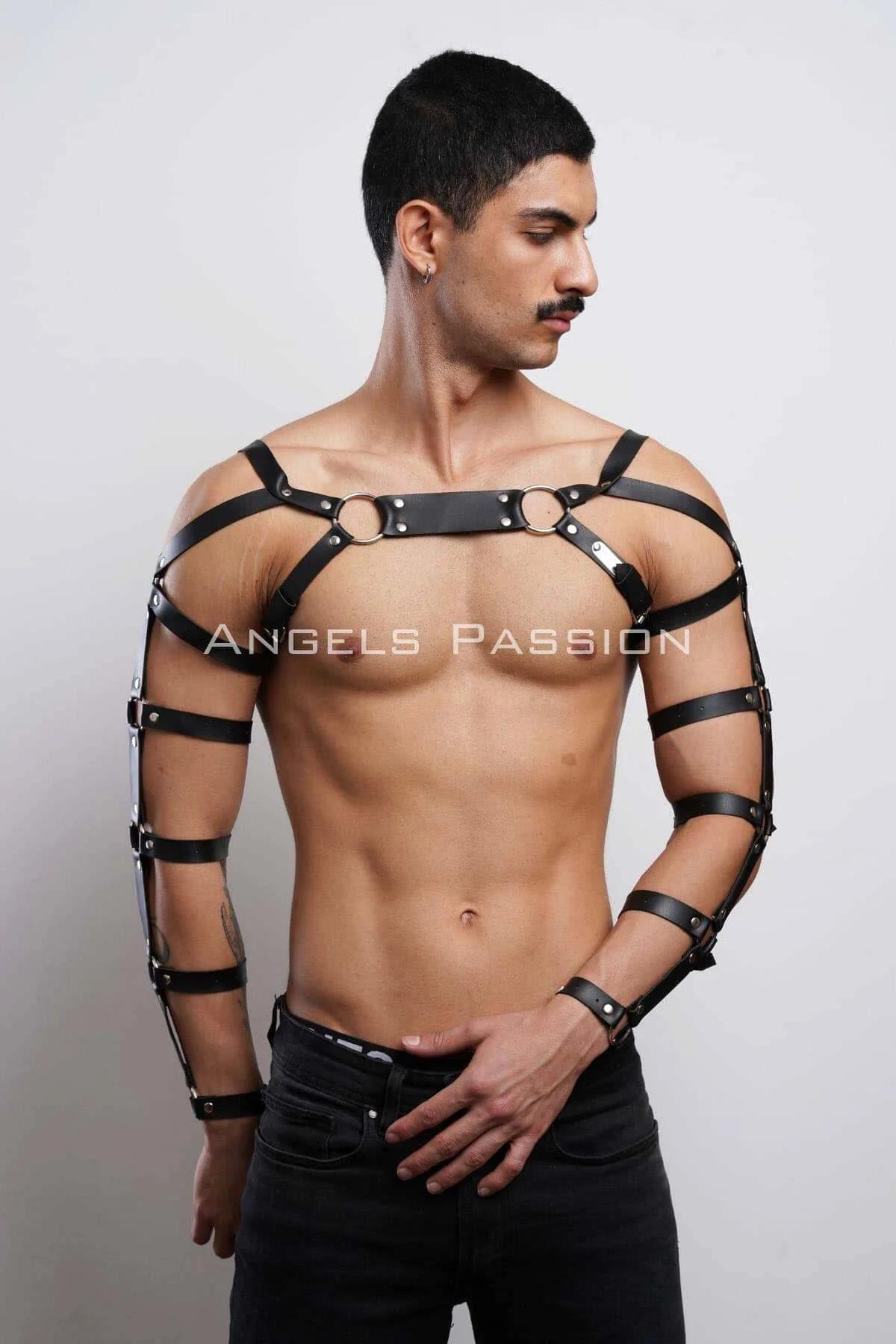 Front view black faux leather arm harness with stacked shoulder-to-wrist buckle straps and chest O-ring detail