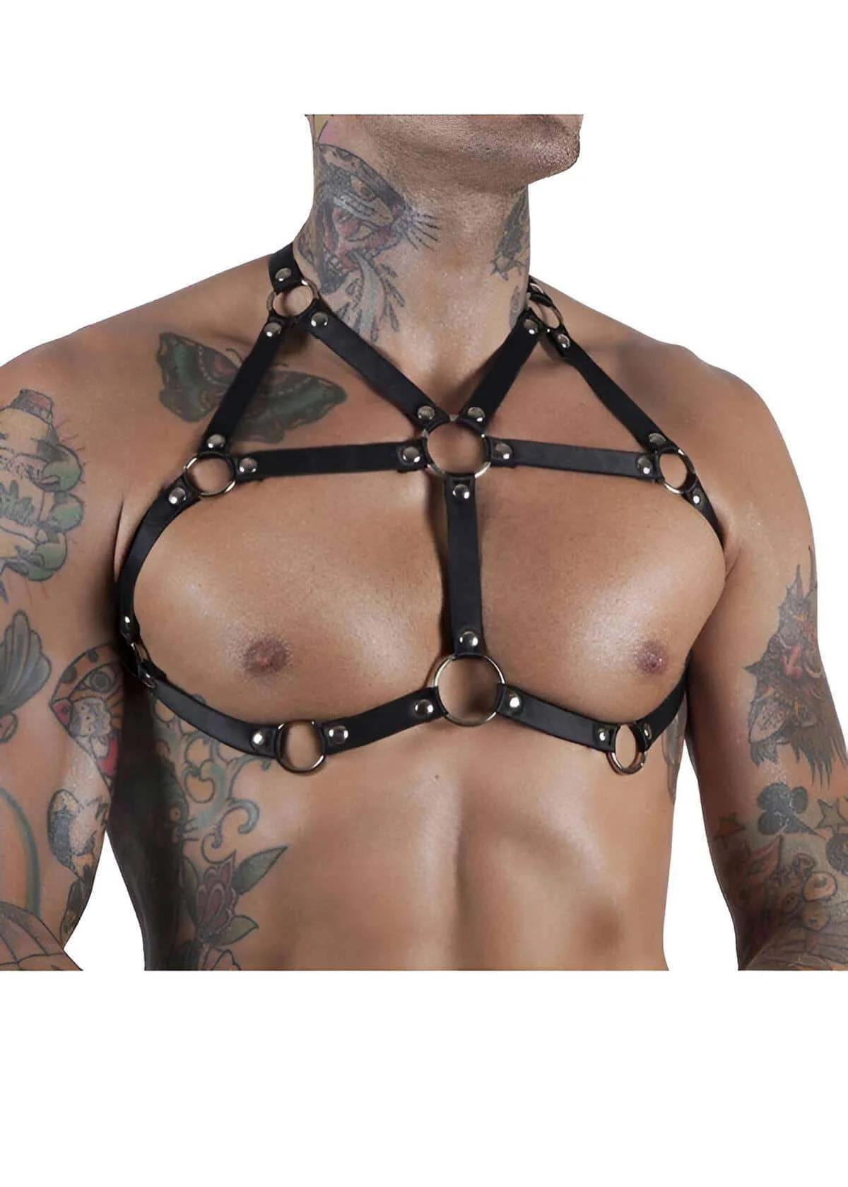 black faux leather chest harness with three silver O-rings and rivet studs worn on male torso