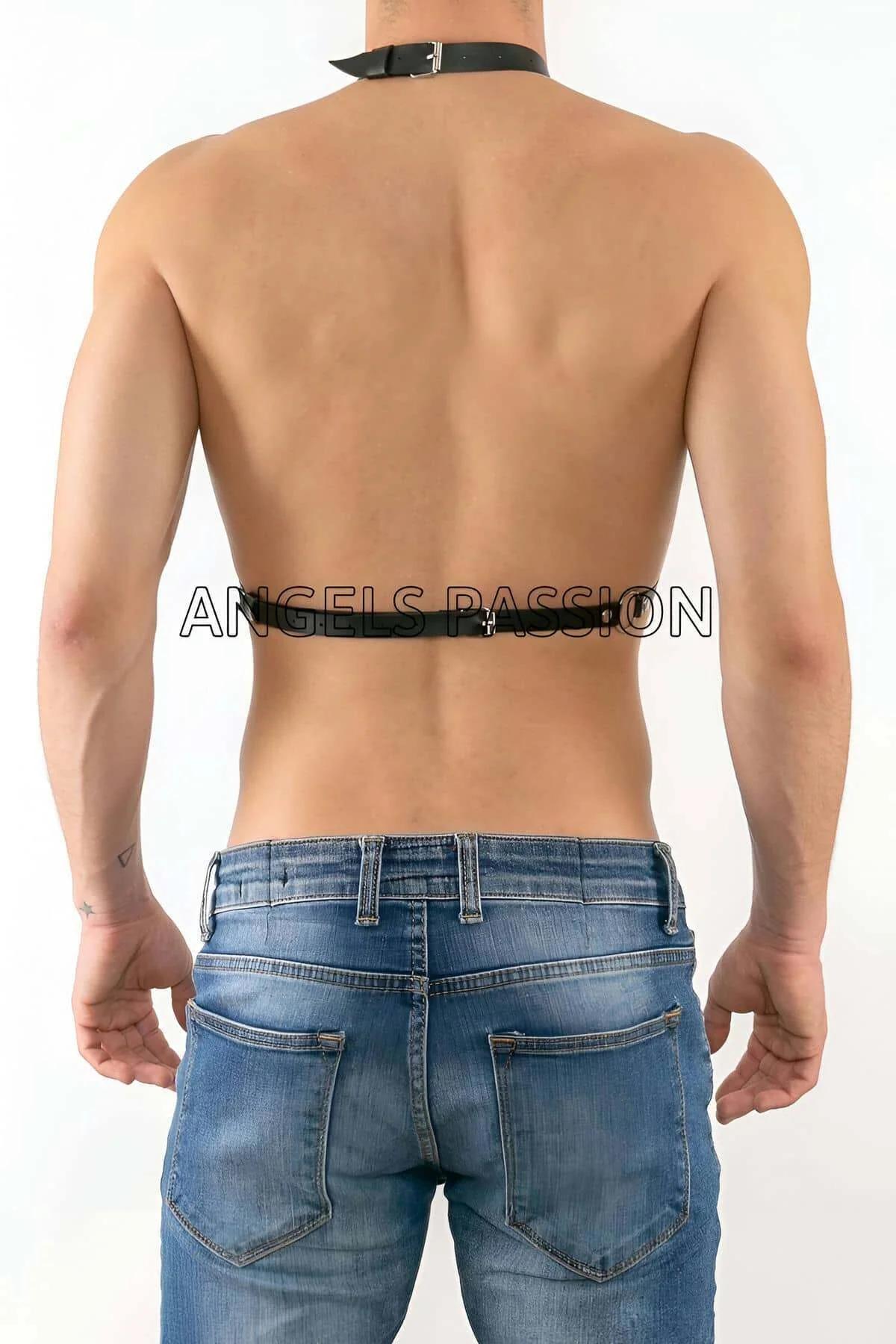 close-up of silver-tone alloy chain drape and O-ring hardware on black faux leather chest harness