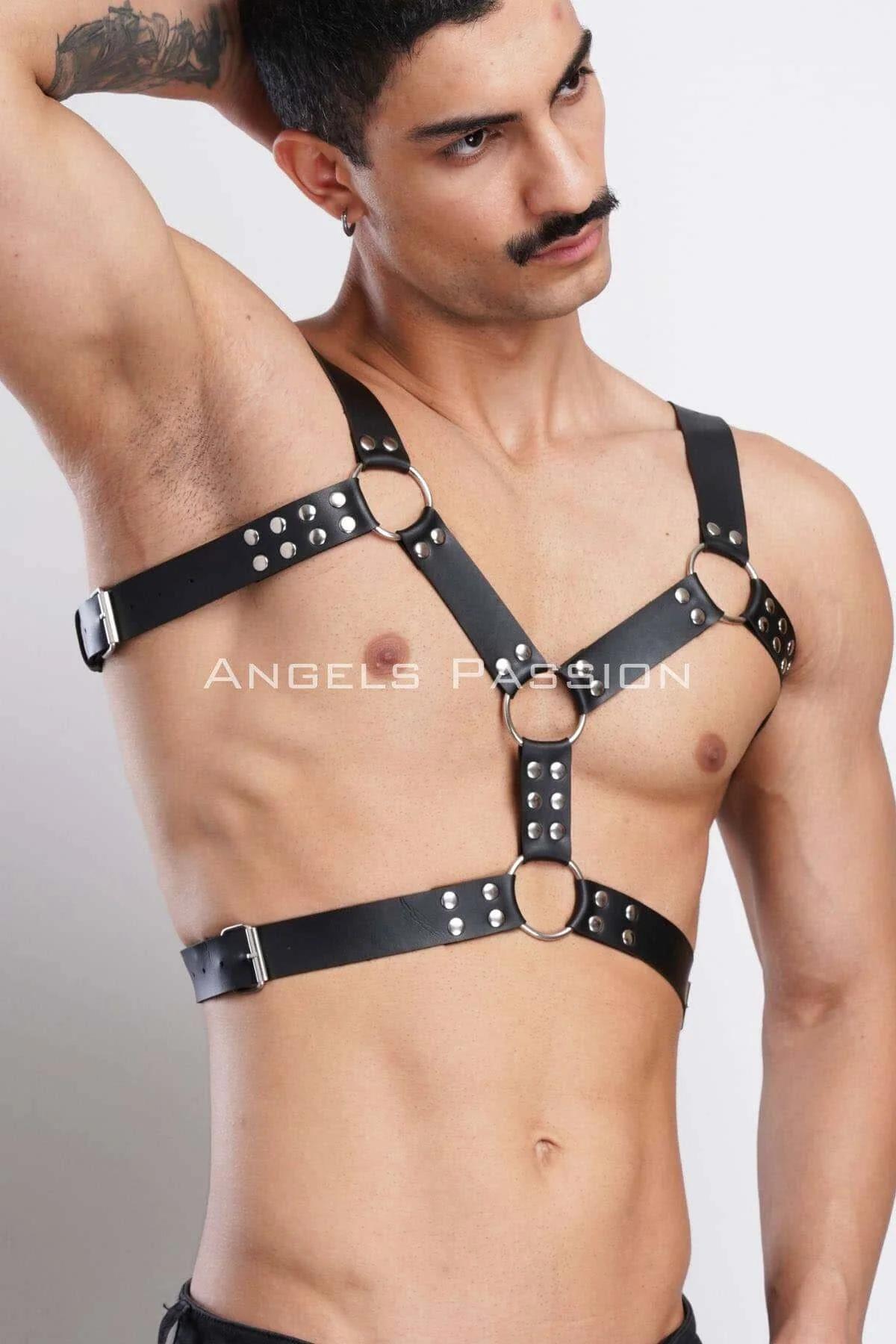 Side-release silver buckle on adjustable waist band of black PU leather chest harness