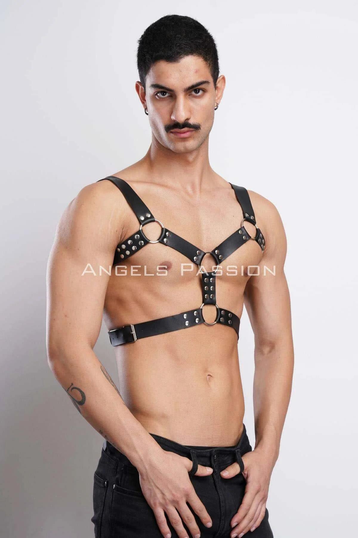 Back view of black studded faux leather chest harness showing fixed shoulder strap configuration