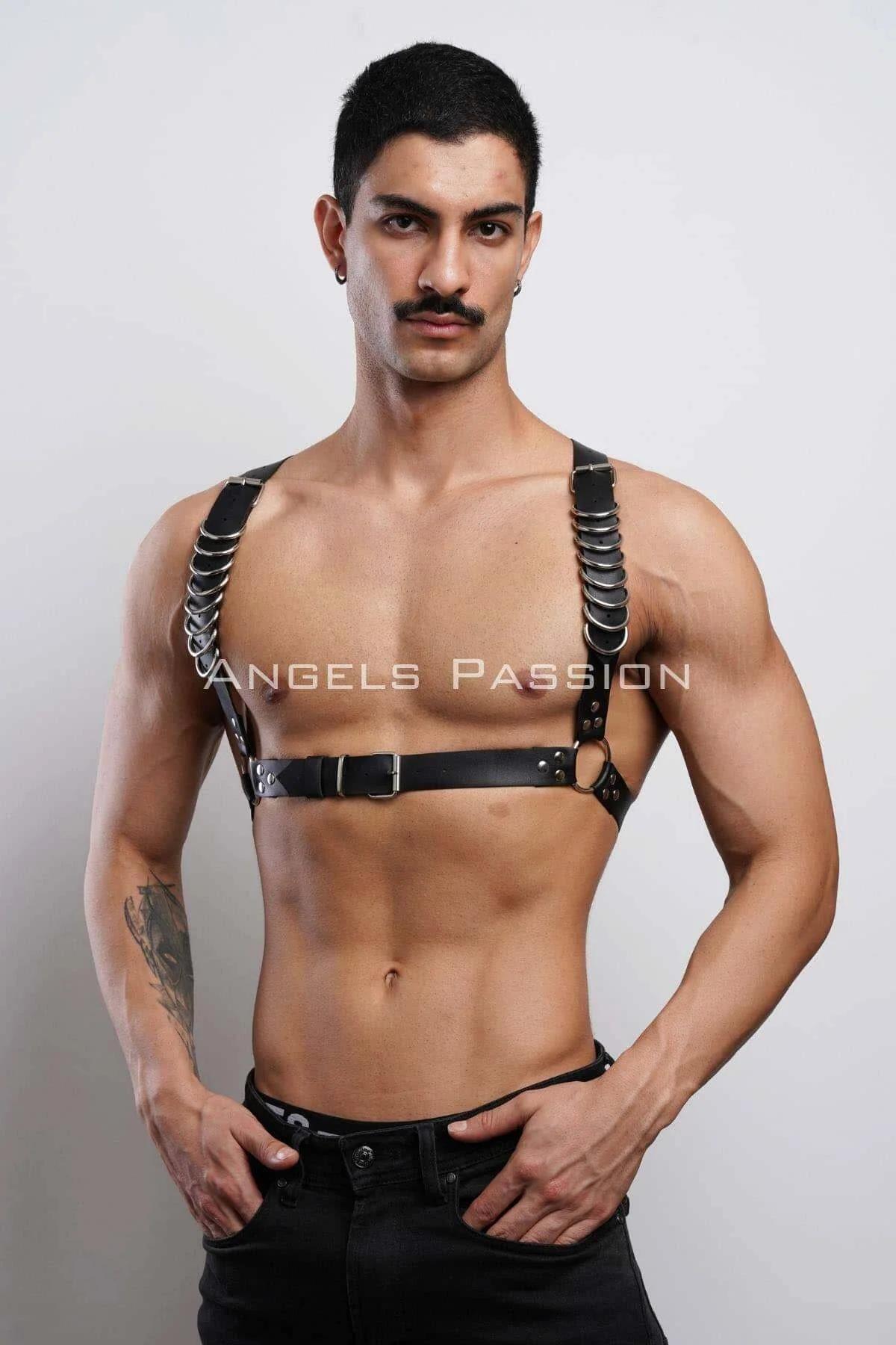 Close-up of silver O-ring chain detail on black faux leather chest strap