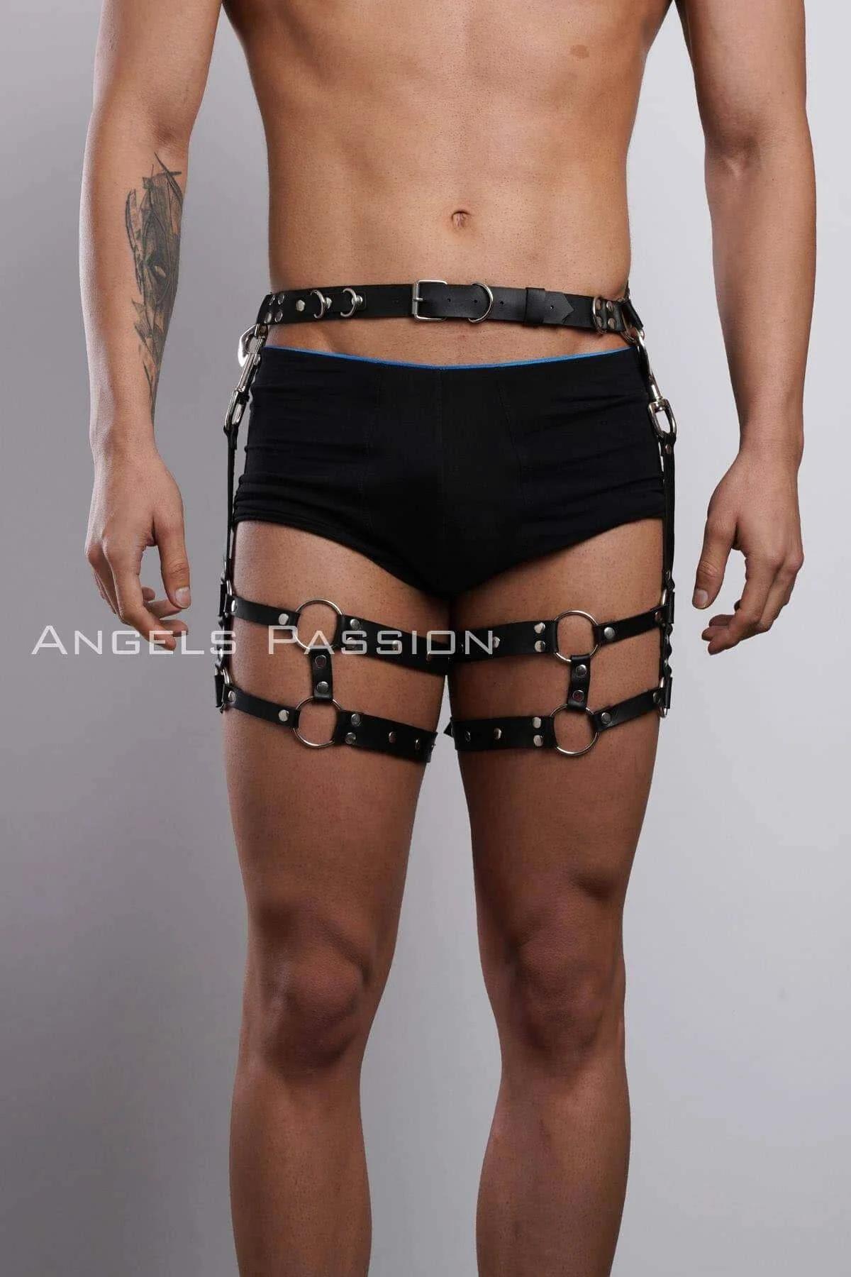 Black faux leather thigh harness flat lay showing dual bands and O-ring hardware