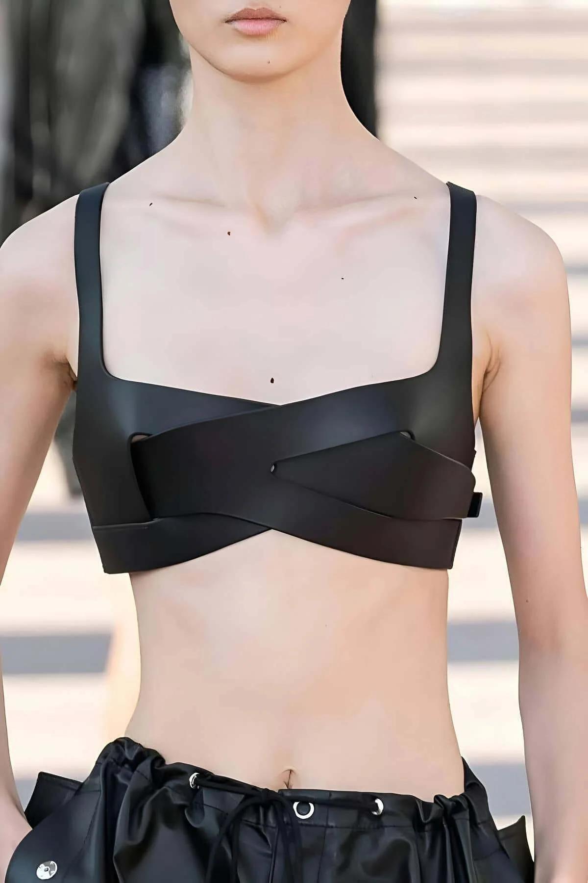 black matte faux leather criss-cross chest harness top with wide X-strap detail and structured bralette panel