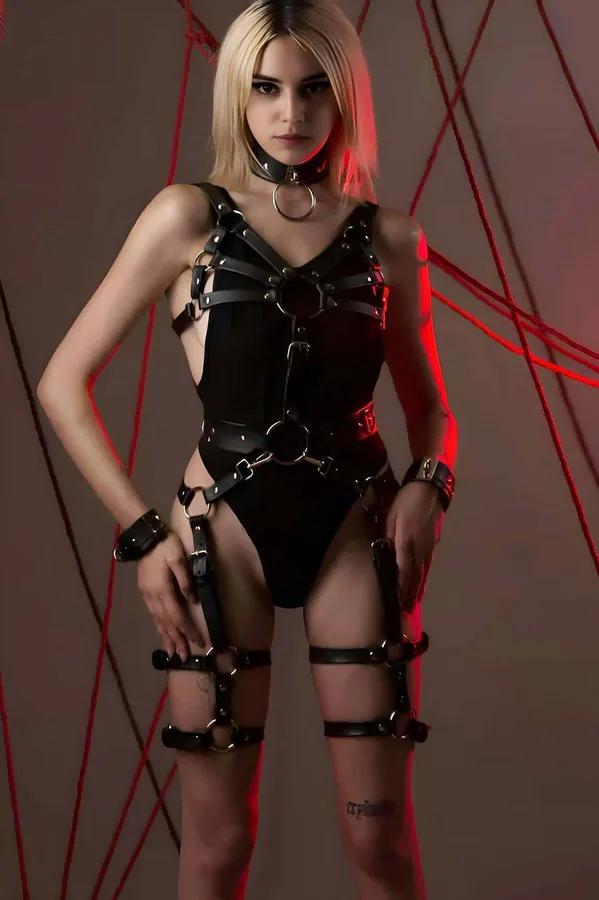 black faux leather full body harness set with O-ring choker, chest straps, thigh garters and wrist cuffs, gold-tone hardware