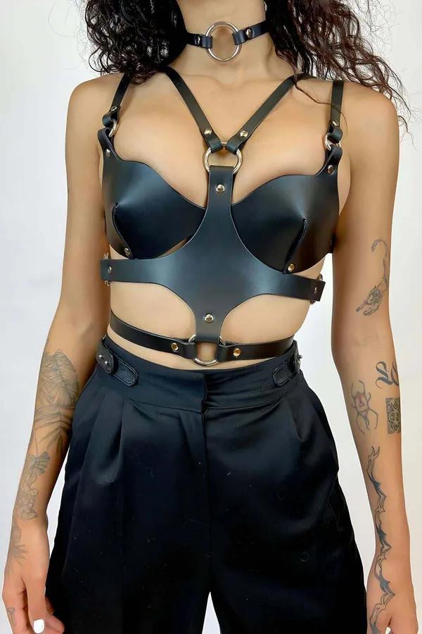 Black matte faux leather full body harness with molded bra cups, three silver O-rings at choker, chest, and waist, and adjust