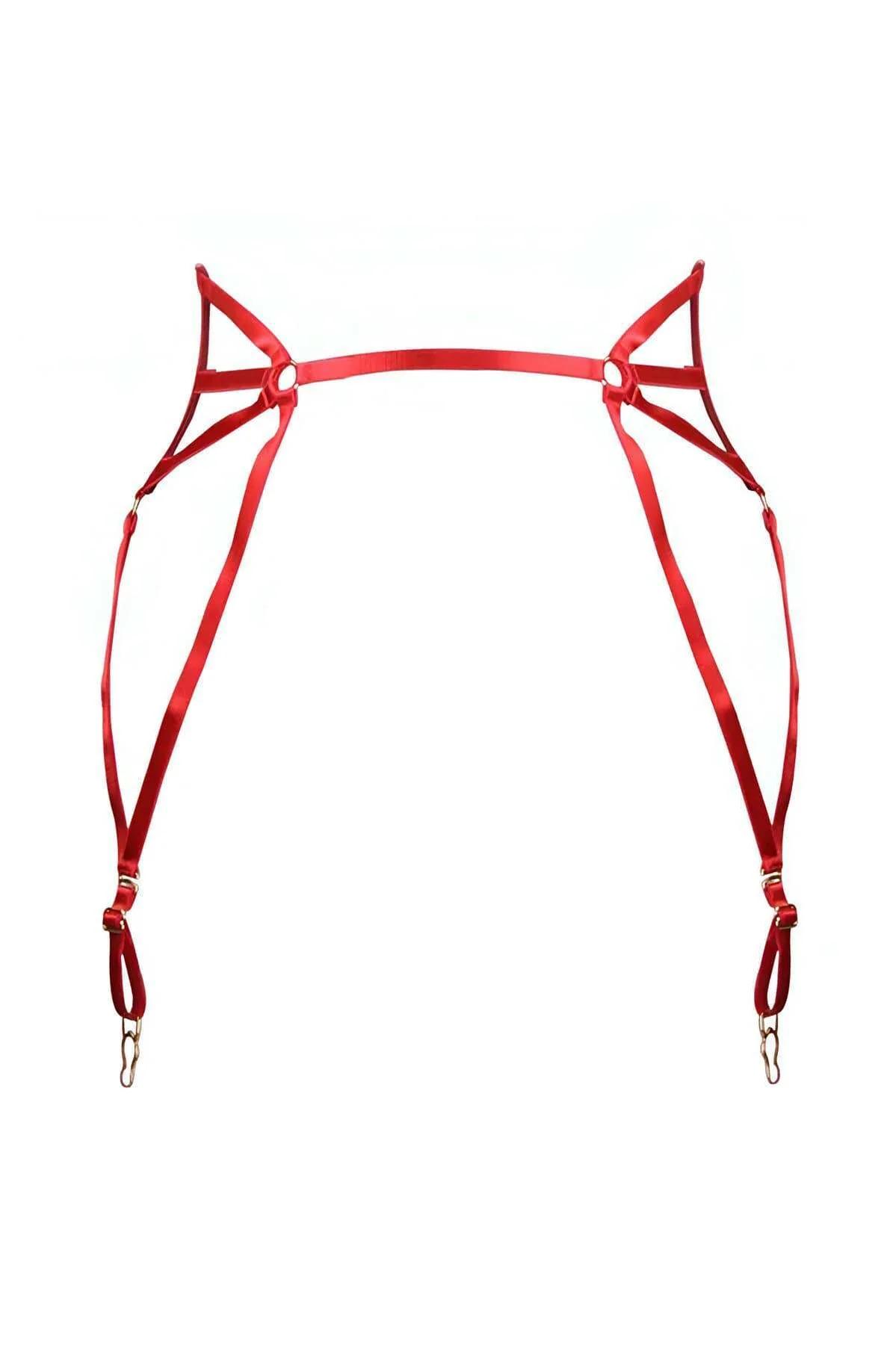 Red strappy garter harness with gold-tone O-ring chest detail and four lobster-claw stocking clips