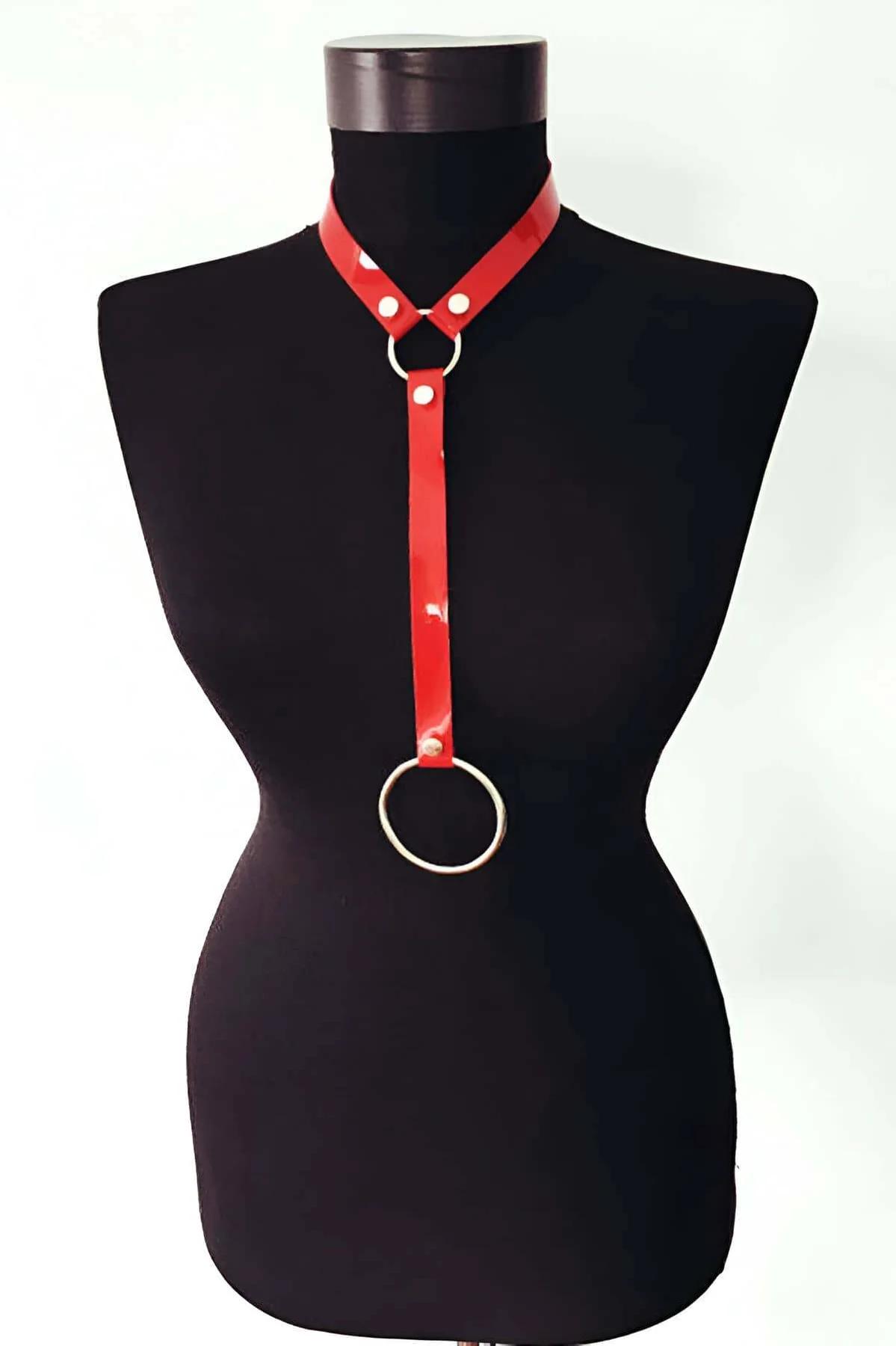 Red patent vegan leather choker harness with large silver O-ring chest drop on black mannequin
