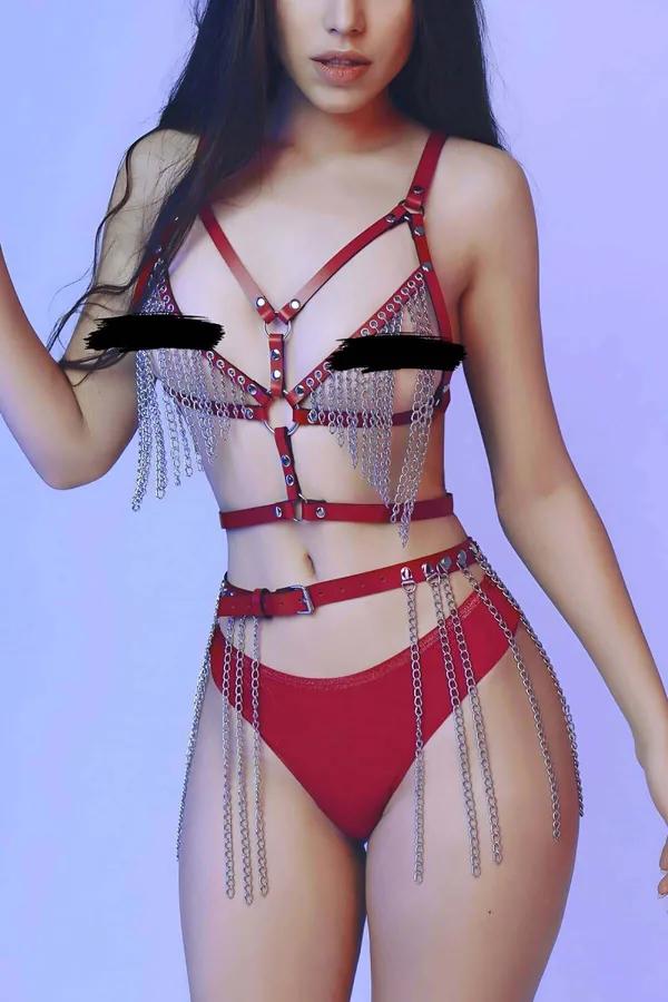 Red faux leather body harness with draped silver-tone chain fringe at chest and hip belt, front view