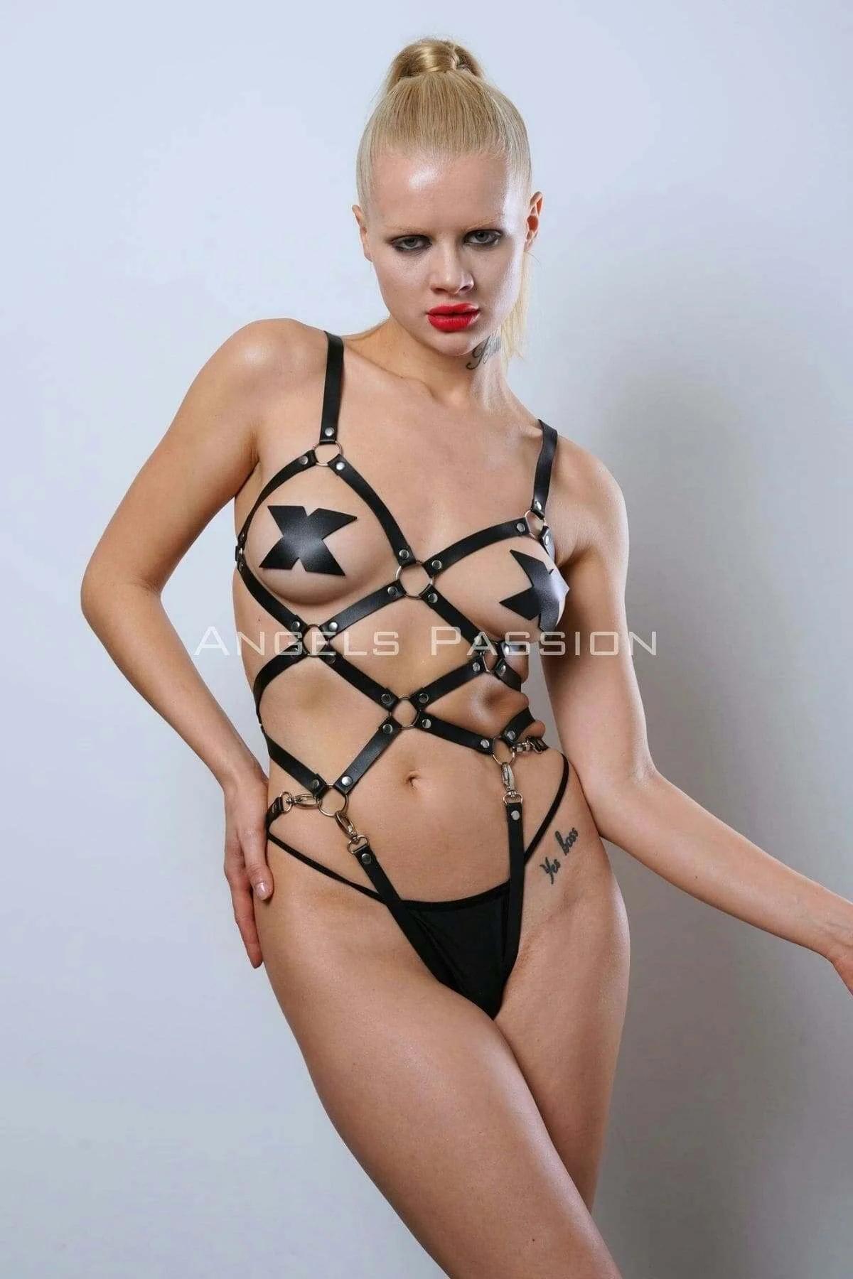 black faux leather strappy body harness with silver O-rings and stud rivets in geometric cage pattern