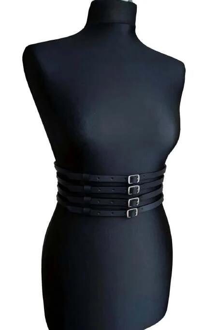 black vegan leather waspie belt four horizontal straps with silver buckles on dress form