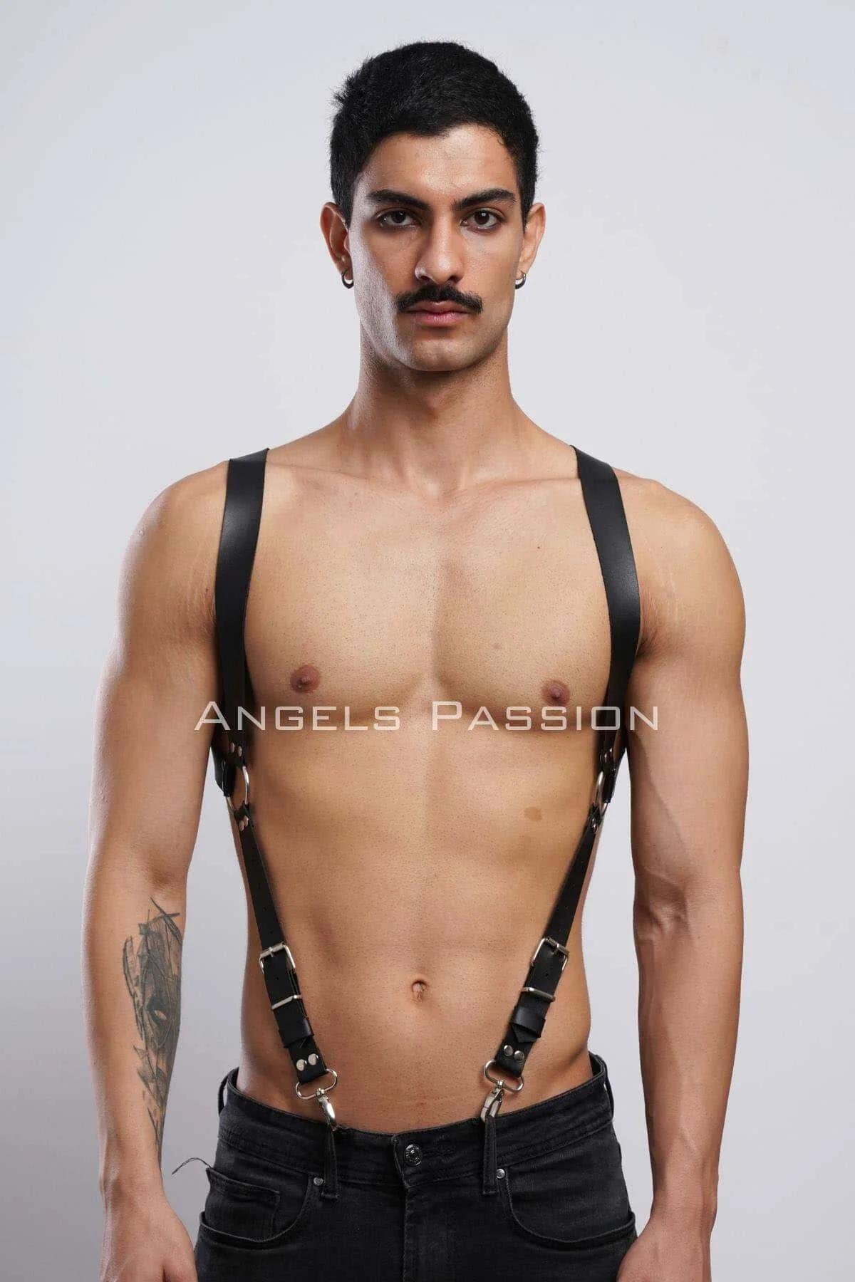 black faux leather adjustable full body harness with wide shoulder straps and silver D-ring hardware on male model