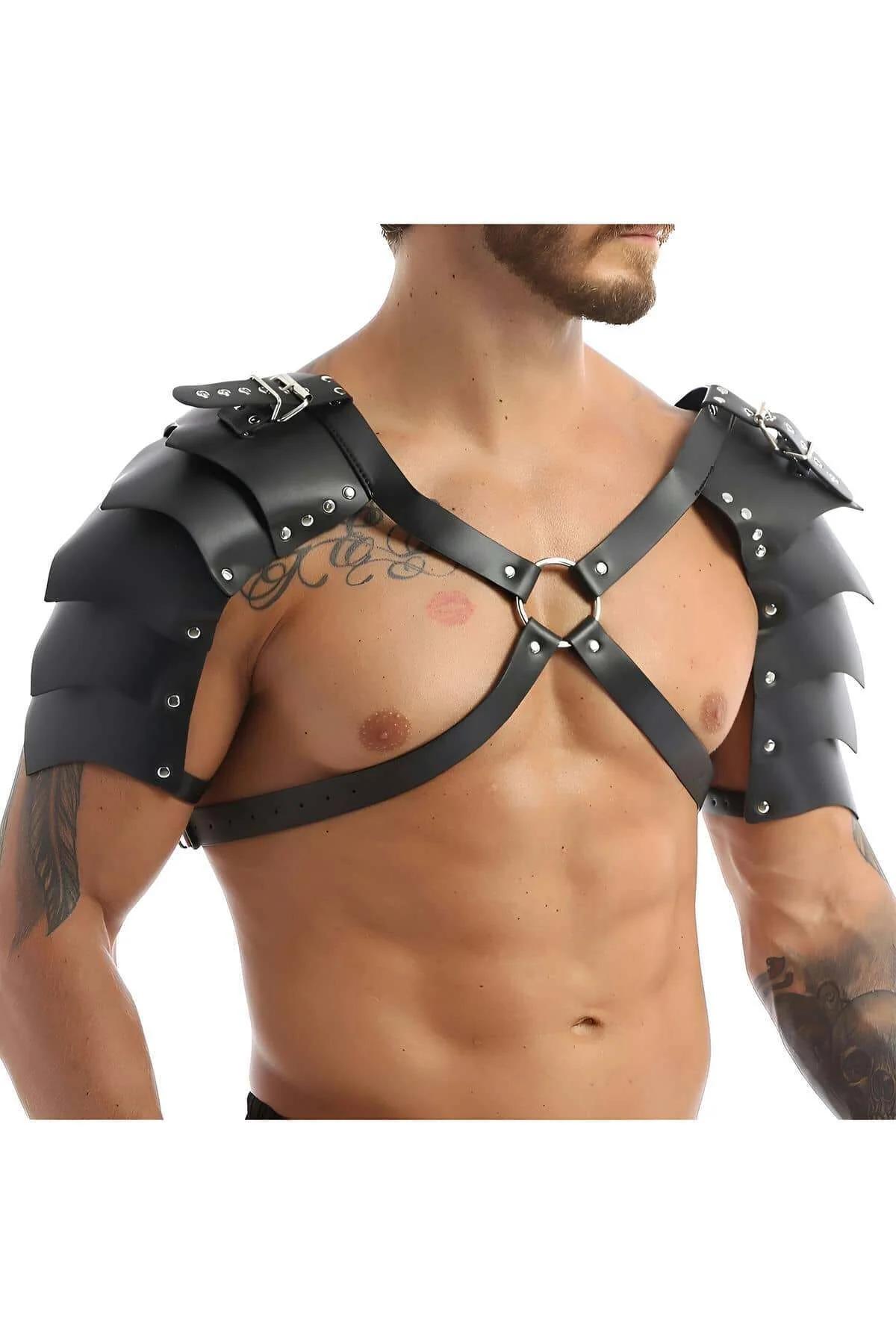 Black faux leather shoulder harness with layered gladiator armor panels, silver rivets, O-ring chest connector, and adjustabl
