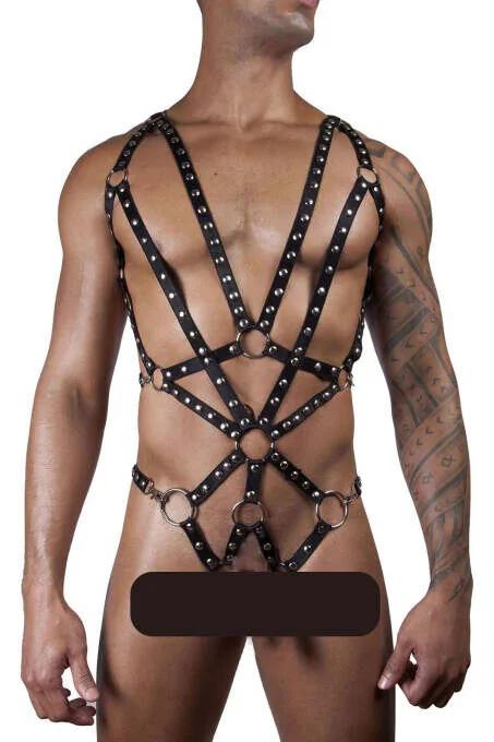 black faux leather full body harness with dense silver dome studs and six O-rings on male model front view