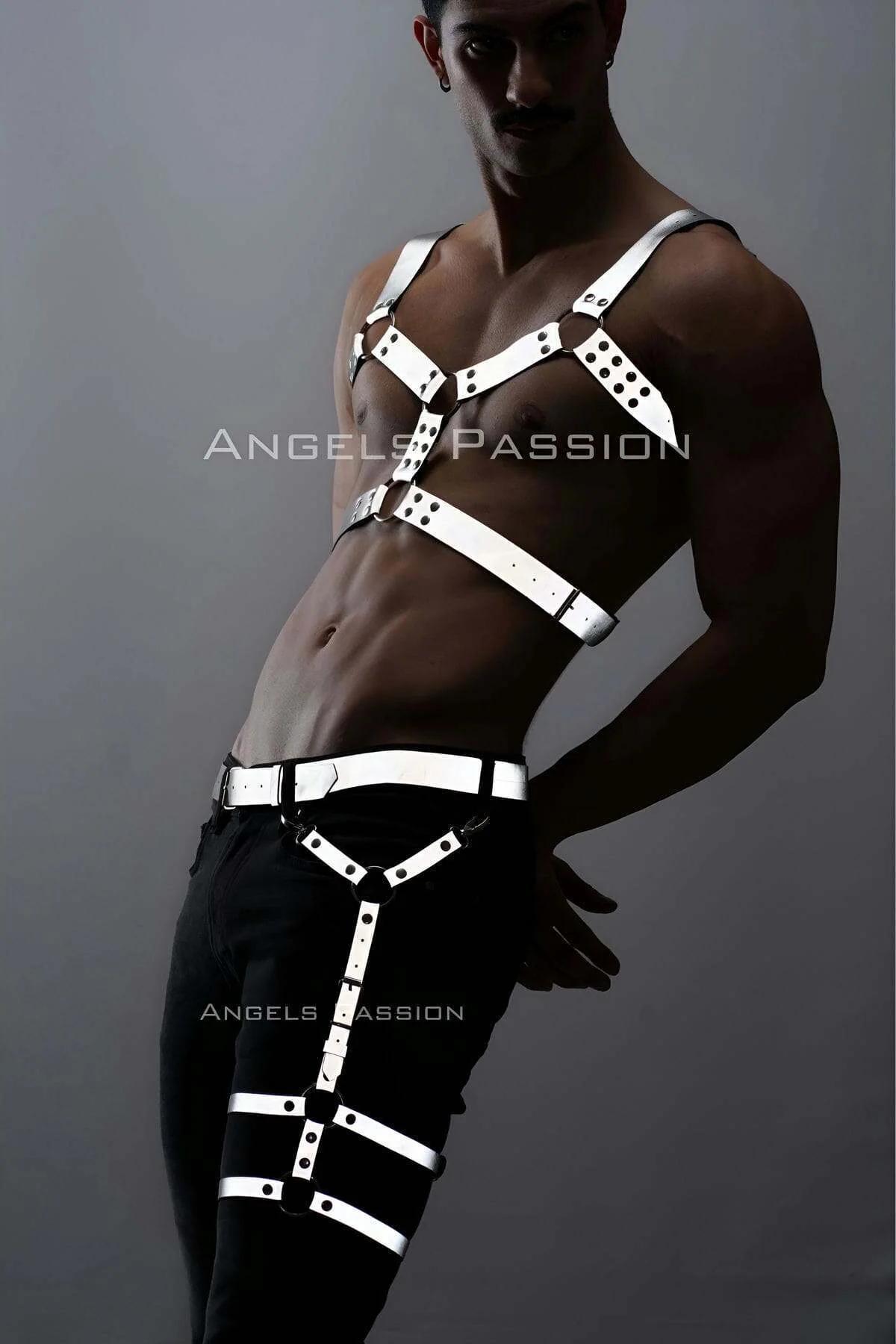 White reflective faux leather chest and thigh cage harness set worn by male model with silver buckle hardware