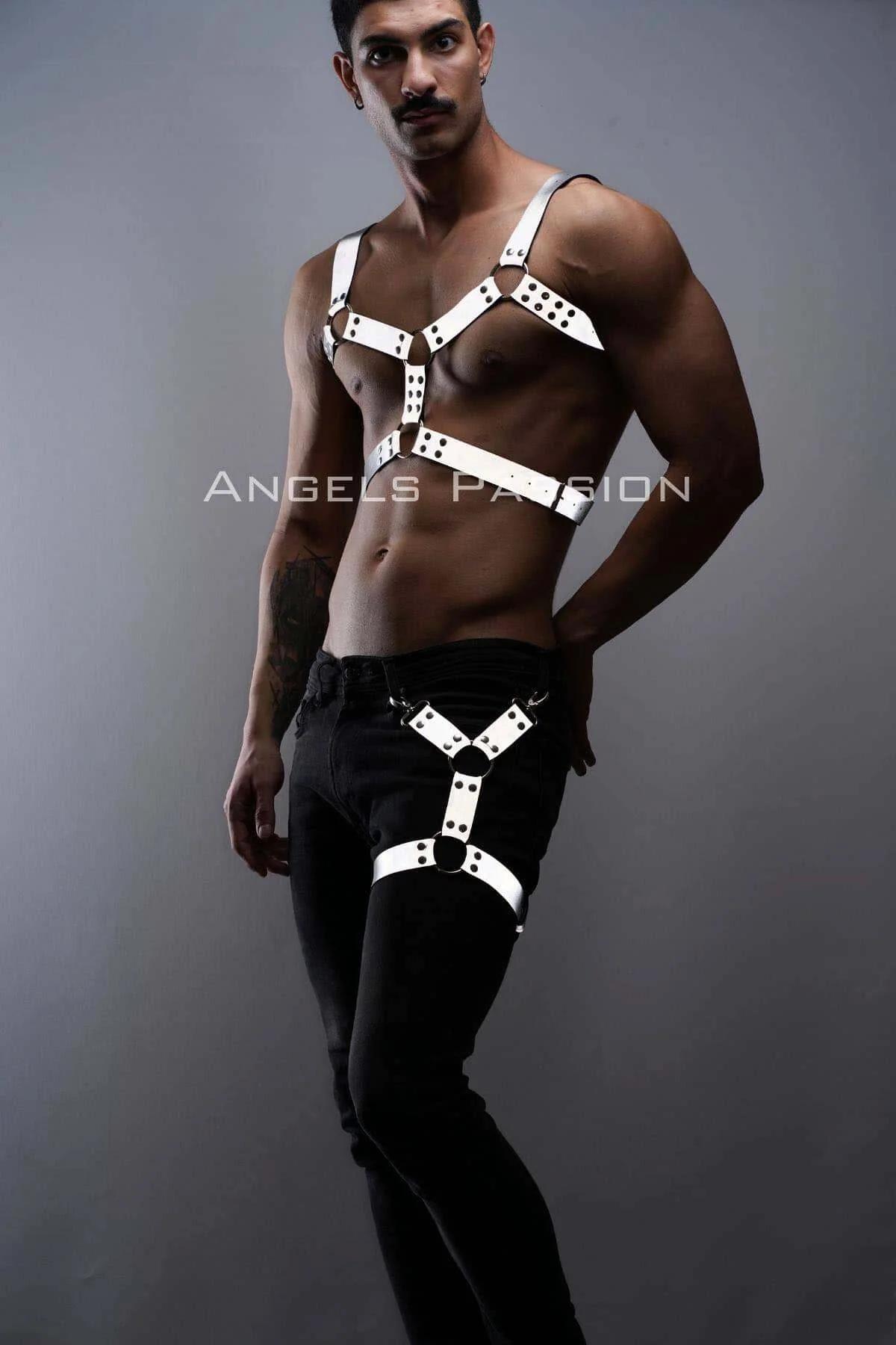 White reflective faux leather chest and leg harness set with black metal O-ring and stud hardware on male model