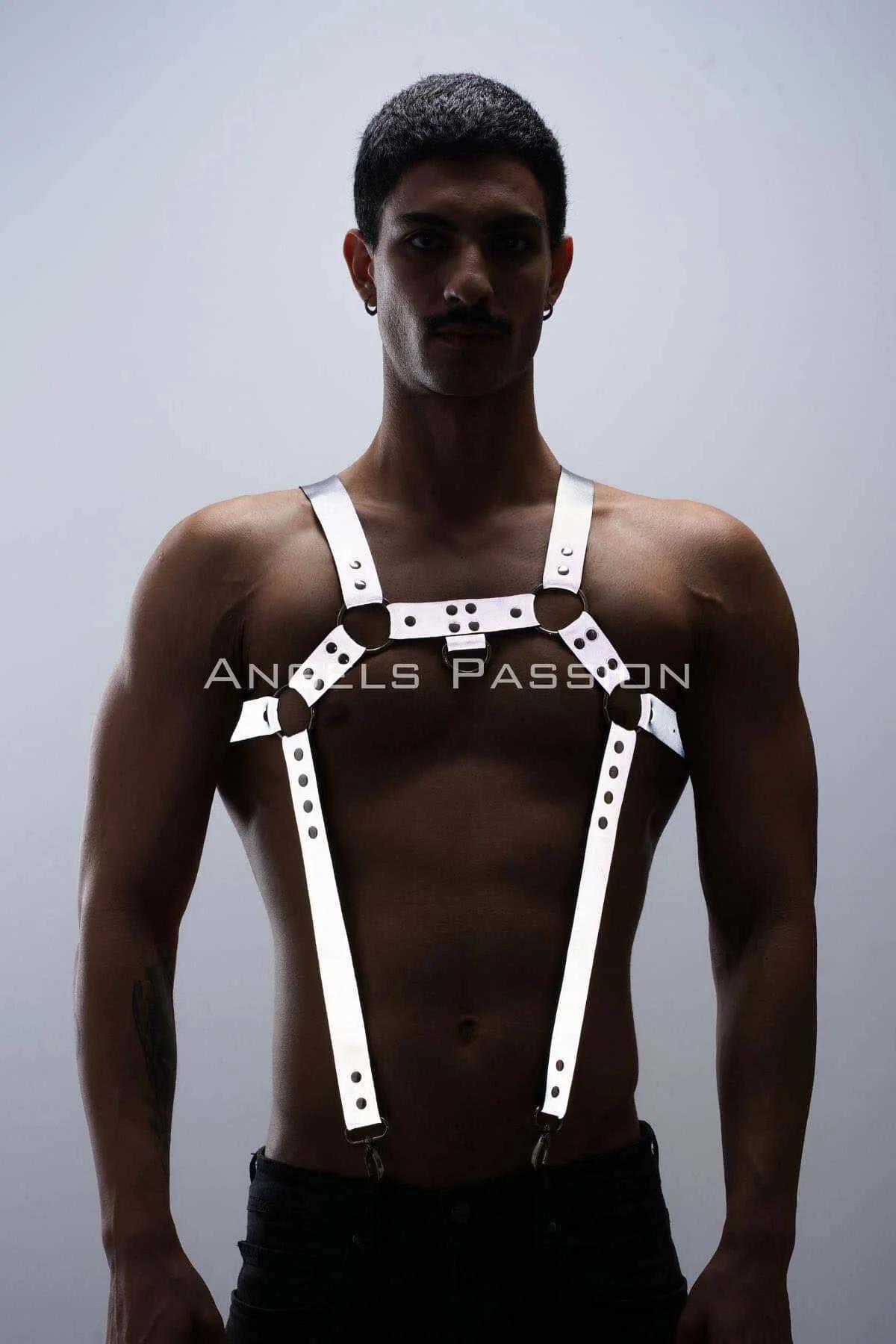 Reflective white faux leather chest and trouser harness set with O-ring and silver swivel clips worn by man
