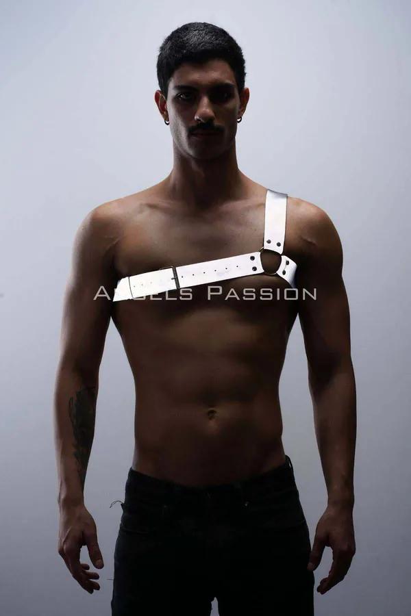 White reflective one-shoulder chest harness with matte black O-ring and rivets worn by male model